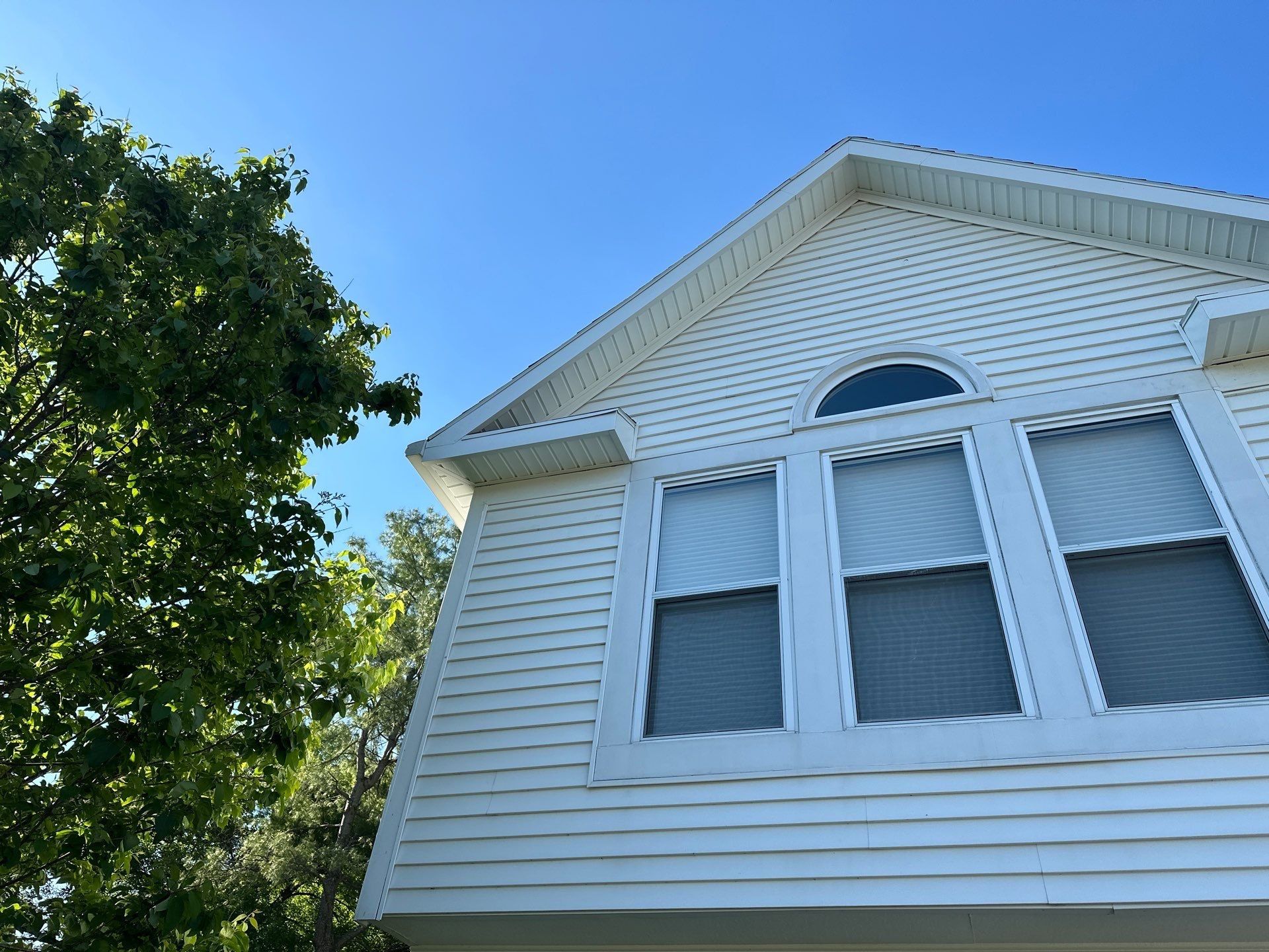 Gable return above the arched window