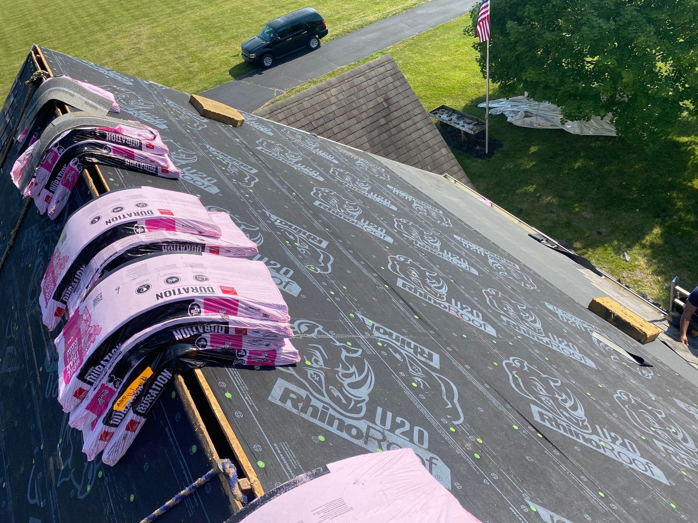 Duration shingle bundles lined up along the ridge on underlayment, Yellow Springs, Ohio.