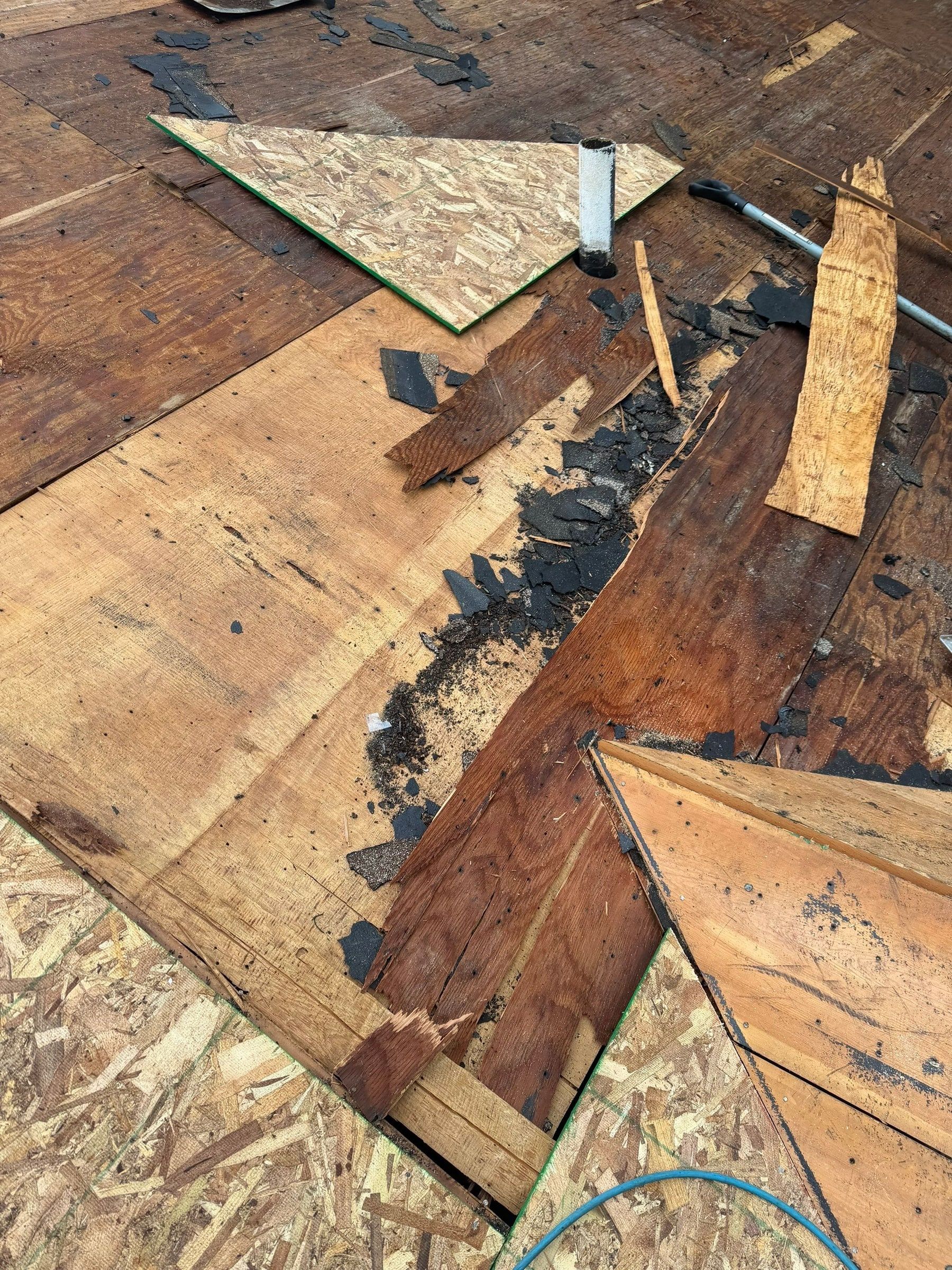 Hole in the decking and roof framing