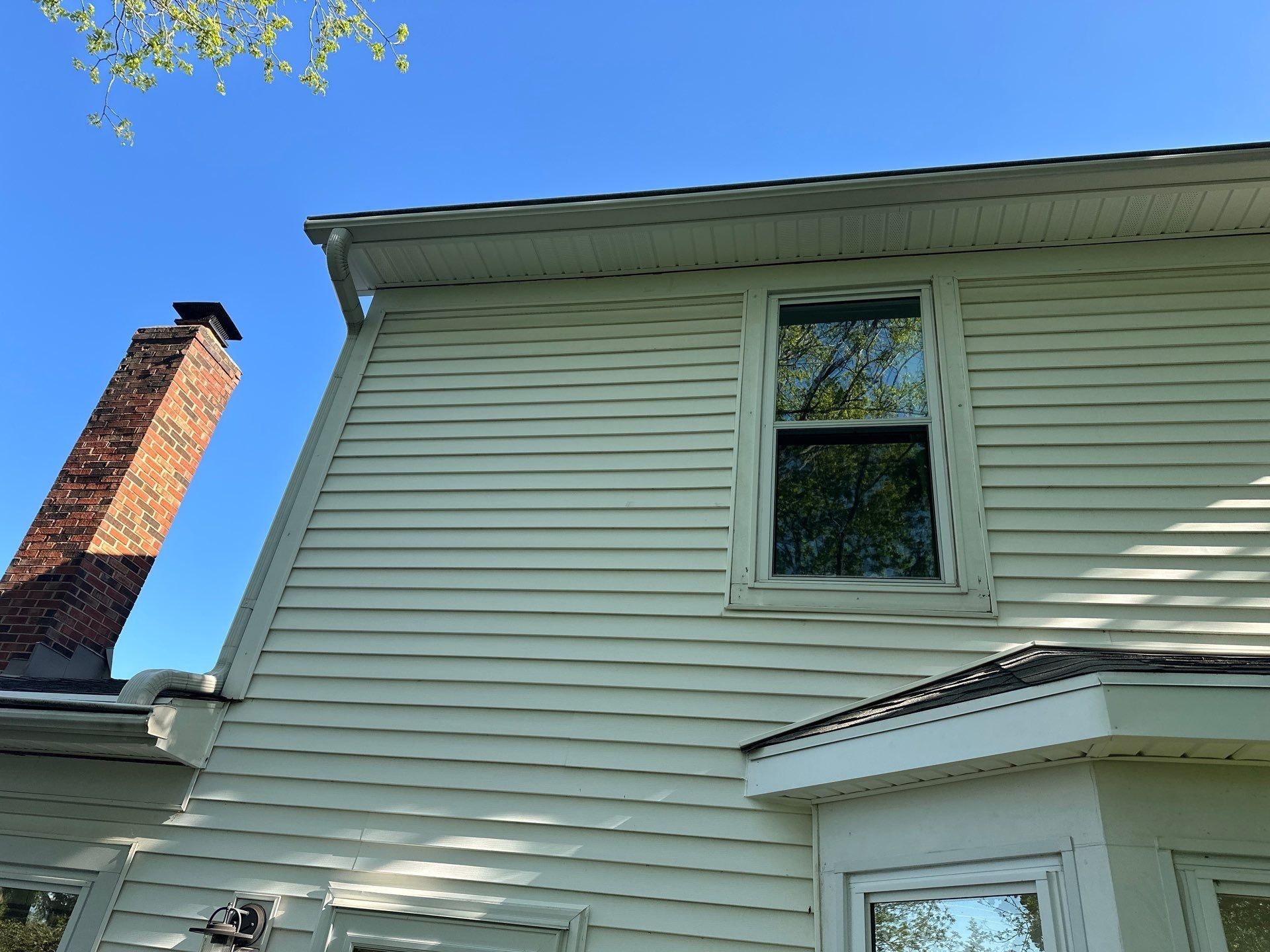 Gable end fascia, soffit and brick chimney