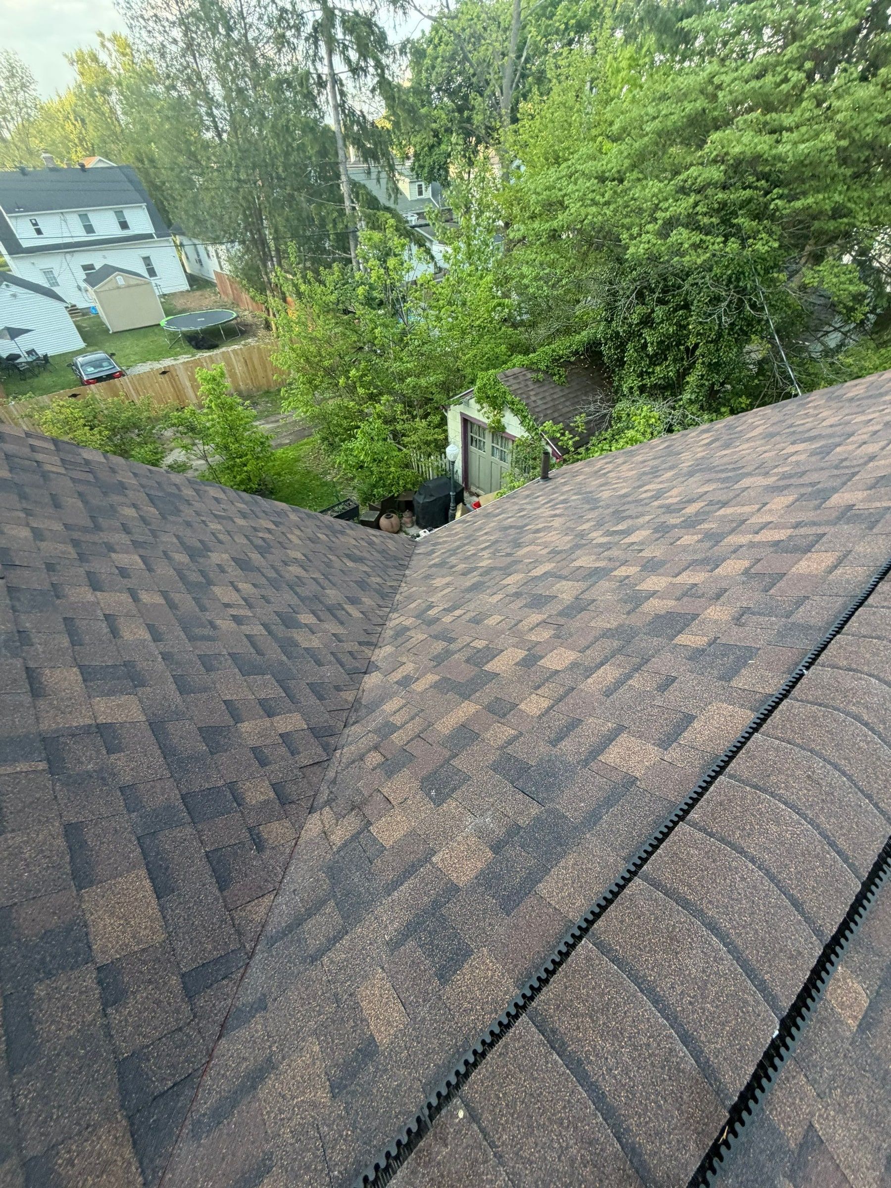 The finished roof and ridge vent above the back yard, Springfield, Ohio.