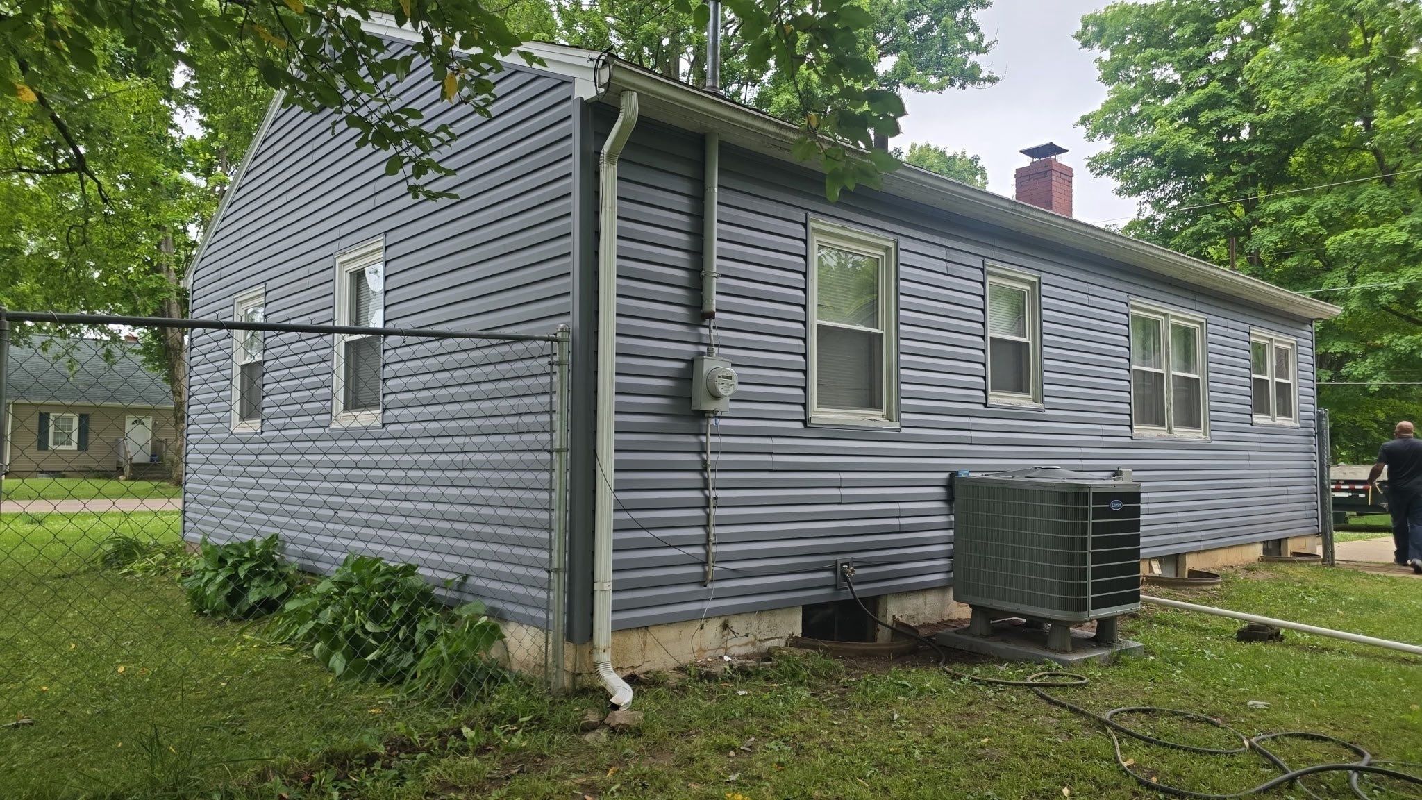The long side of the house in new siding beside the air conditioner, Beavercreek, Ohio.