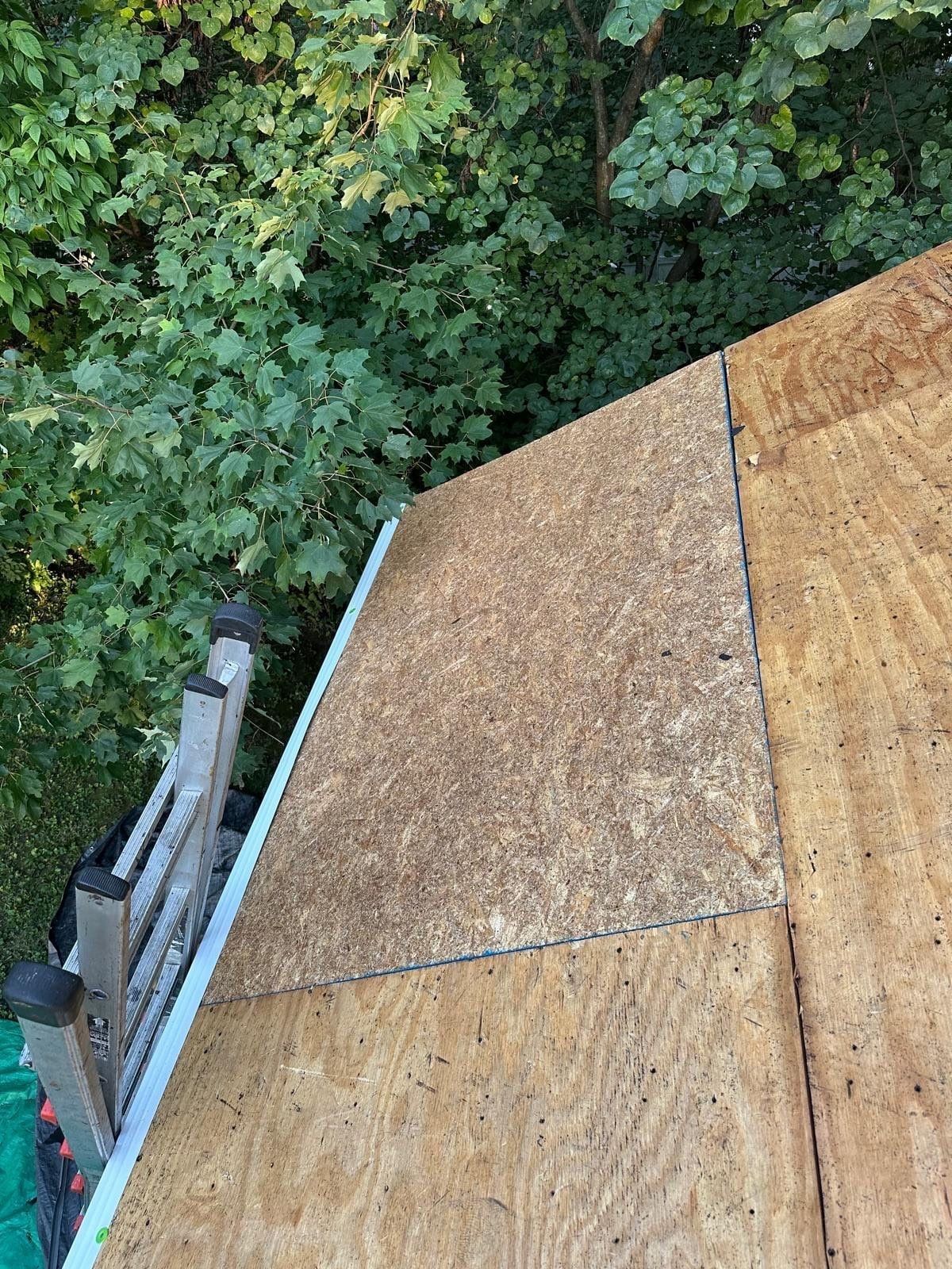New sheathing over the plank deck near the eave, Beavercreek, Ohio.