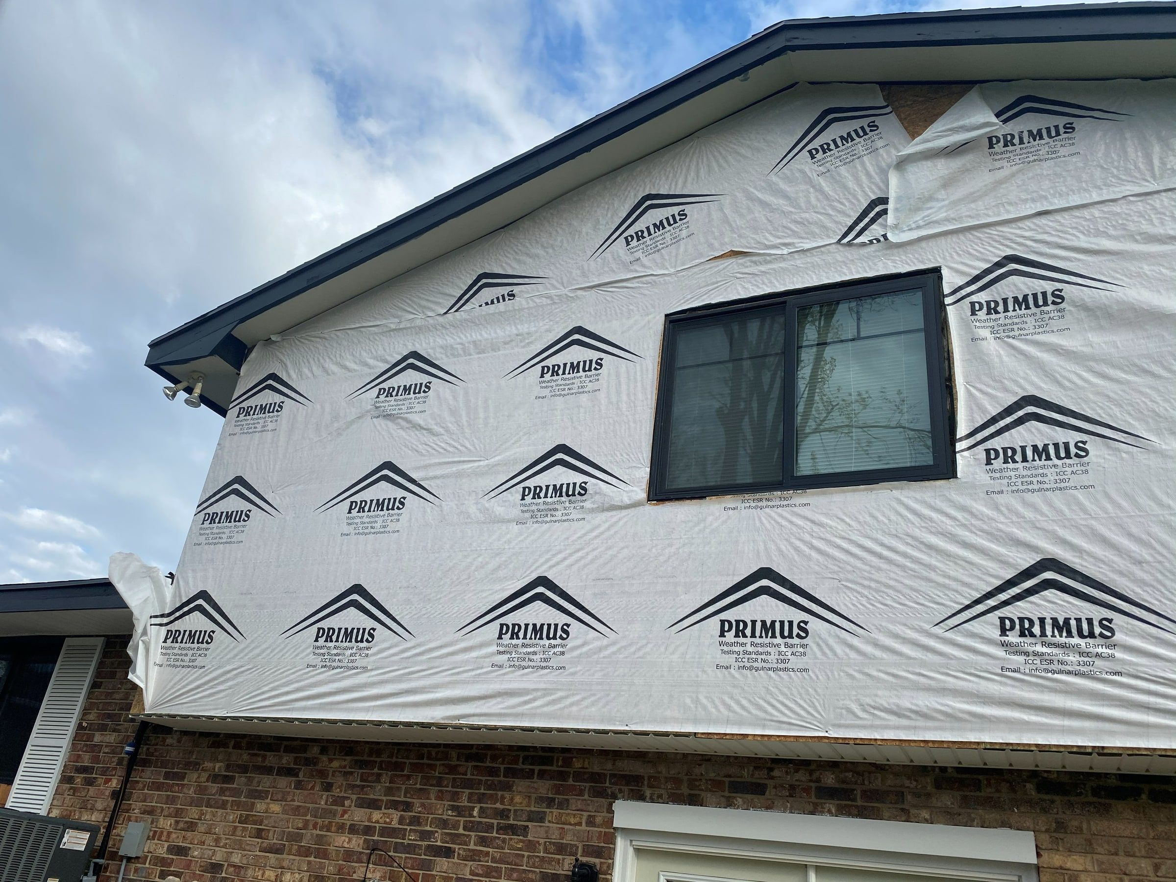 The wrapped back wall from below, over the brick, Beavercreek, Ohio.