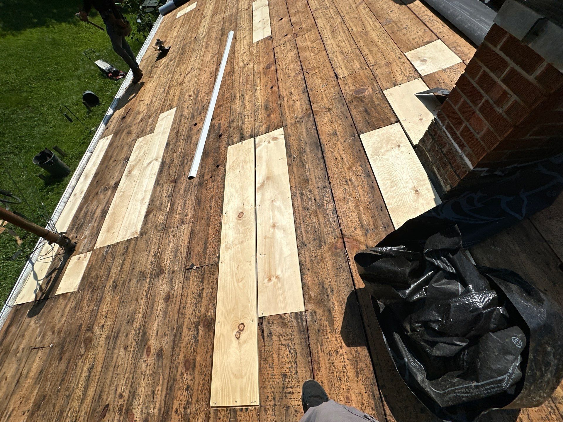 New boards patched into the deck along the chimney, Fairborn, Ohio.