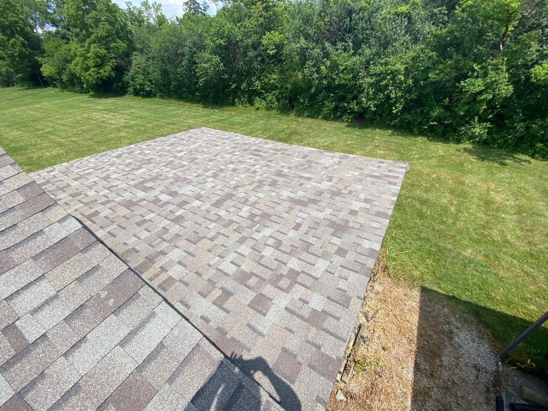Finished shingles on the detached garage roof facing the back field, Yellow Springs, Ohio.