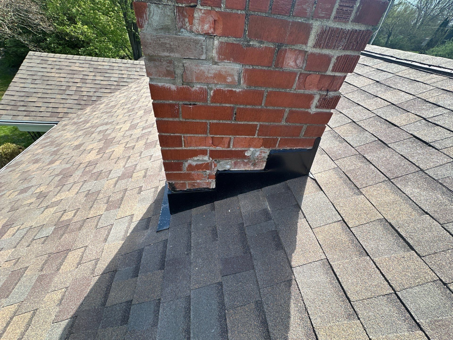 Chimney base and new flashing