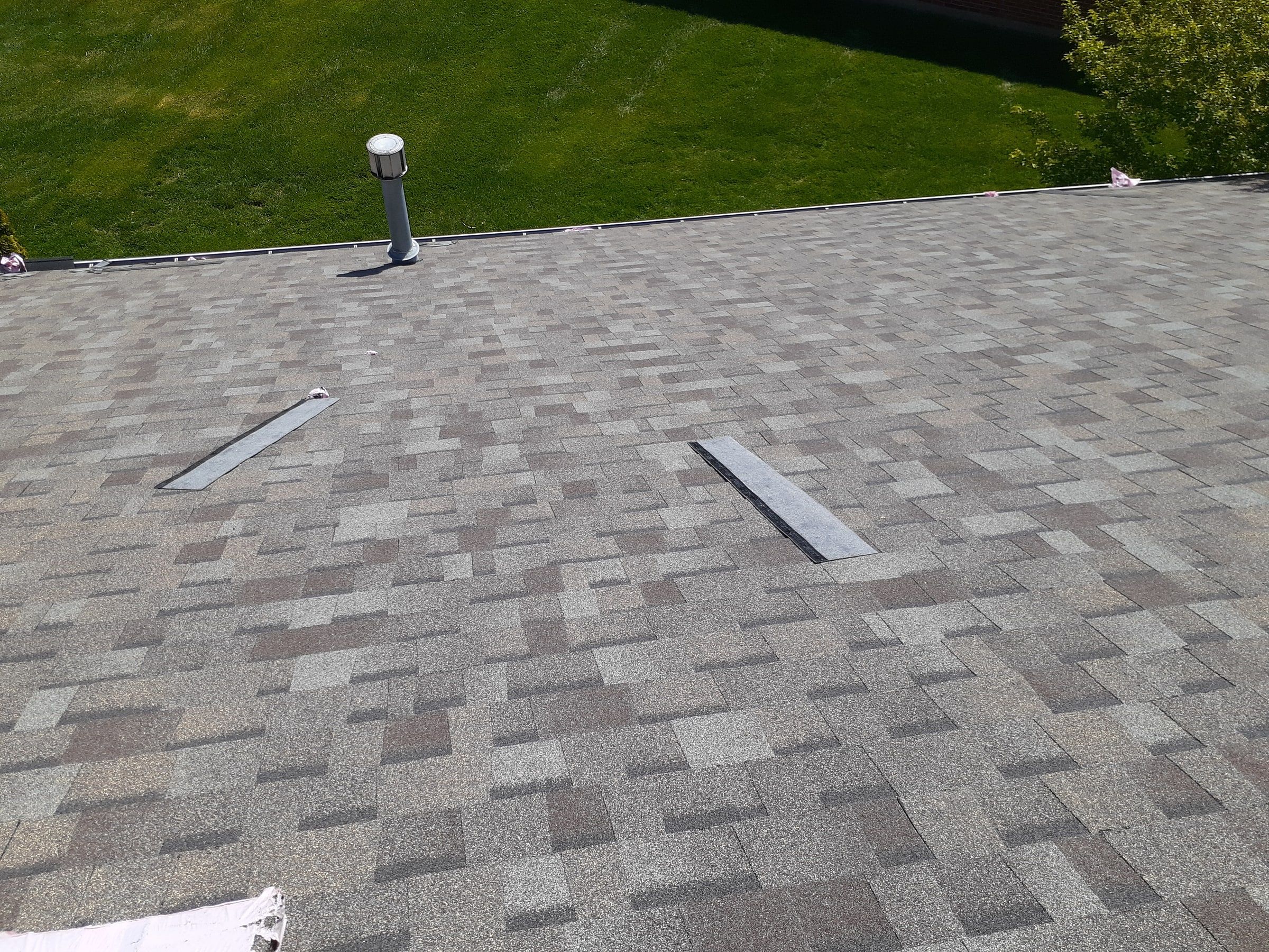 Shingle courses across the slope past the vent