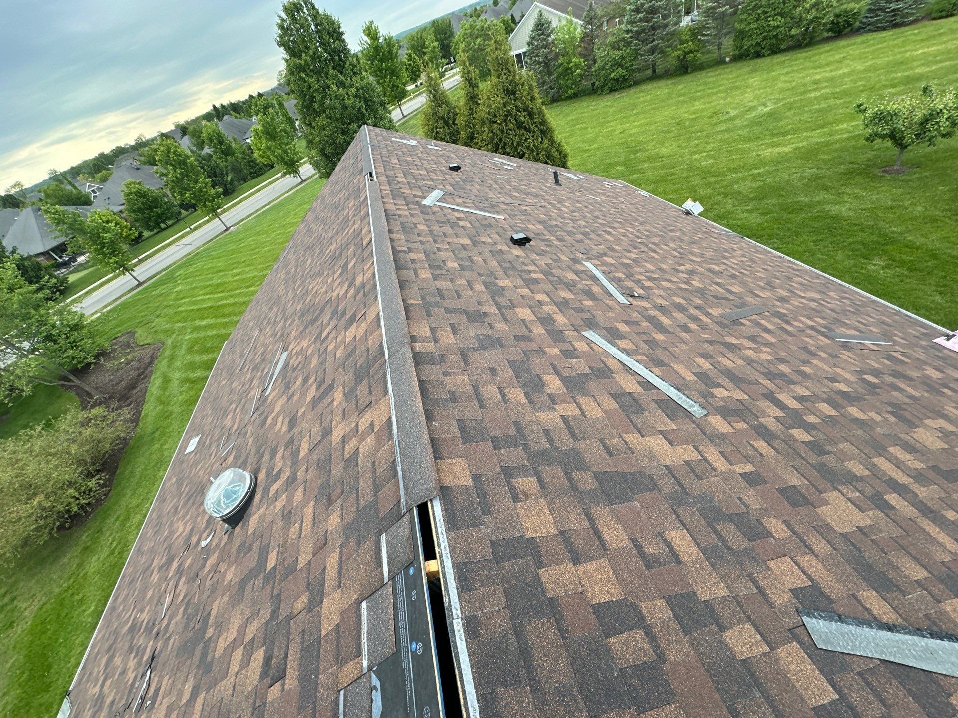 Shingles up the hip toward the ridge