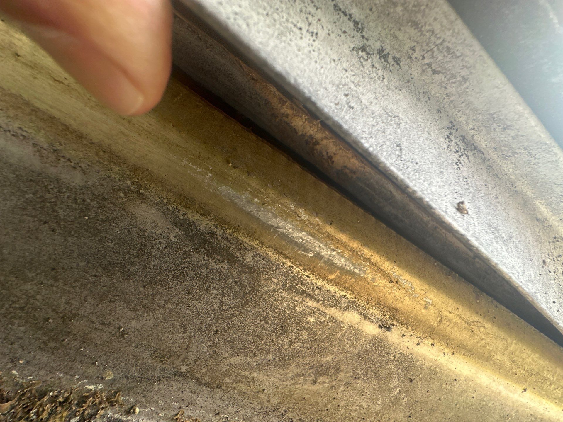 Silt and grit in the gutter