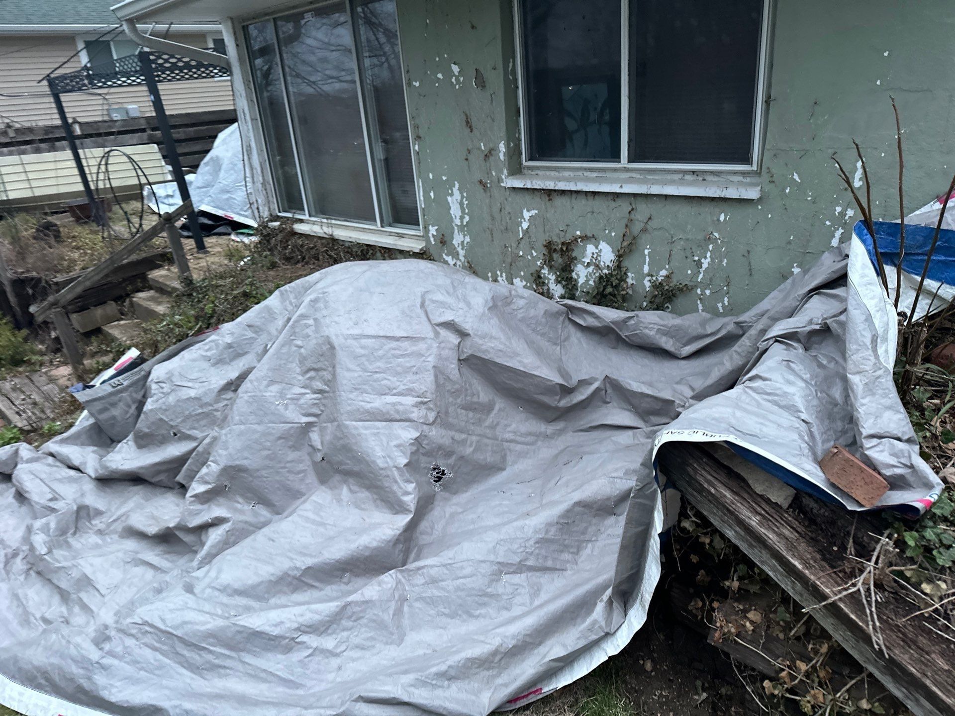 Tarp over the bed and furniture