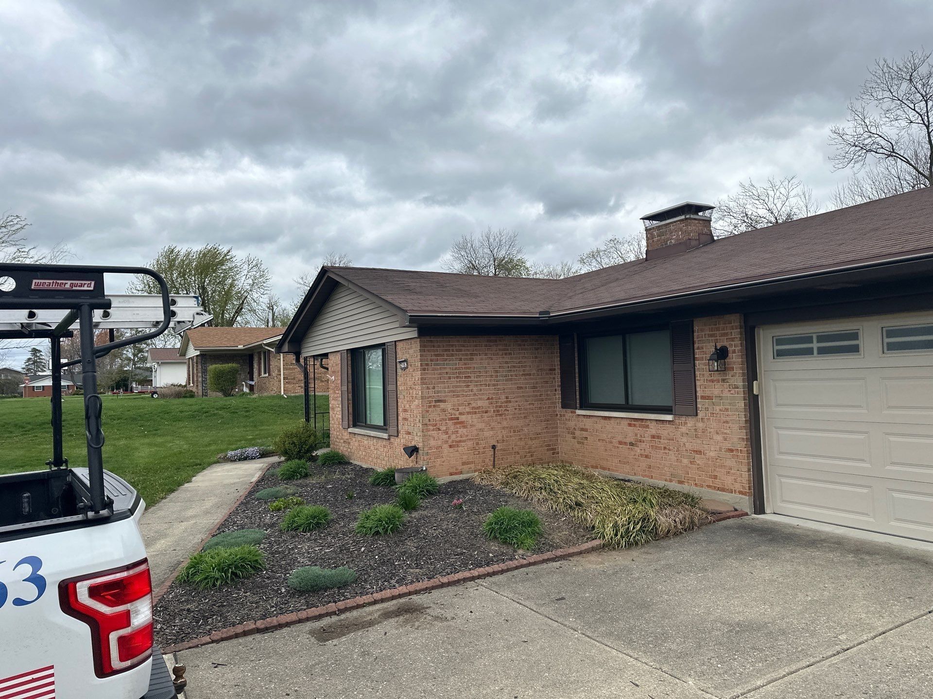 The front of the house and garage from the driveway, Beavercreek, Ohio.