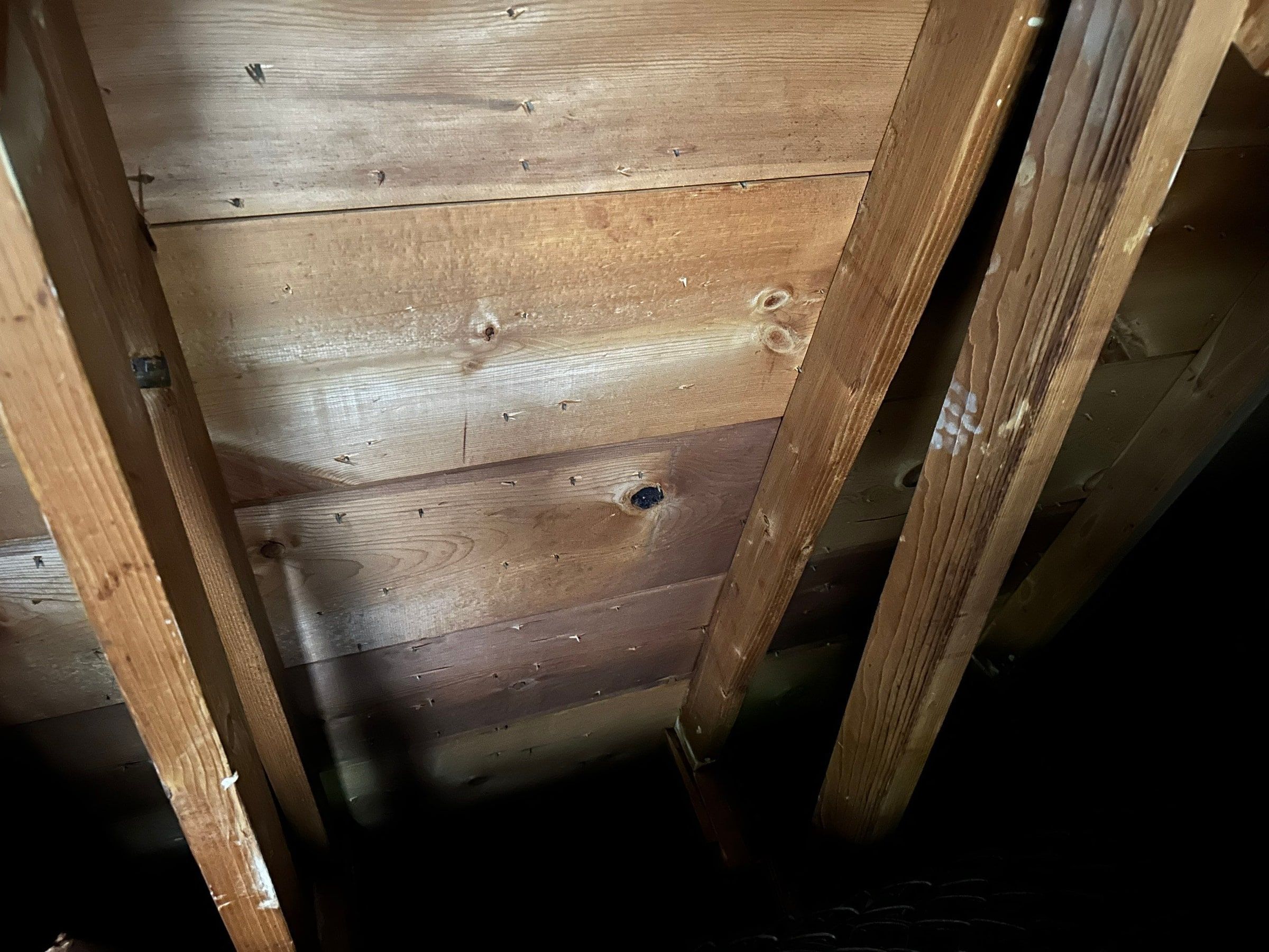 Solid 1x board decking seen from the attic, Kettering, Ohio.