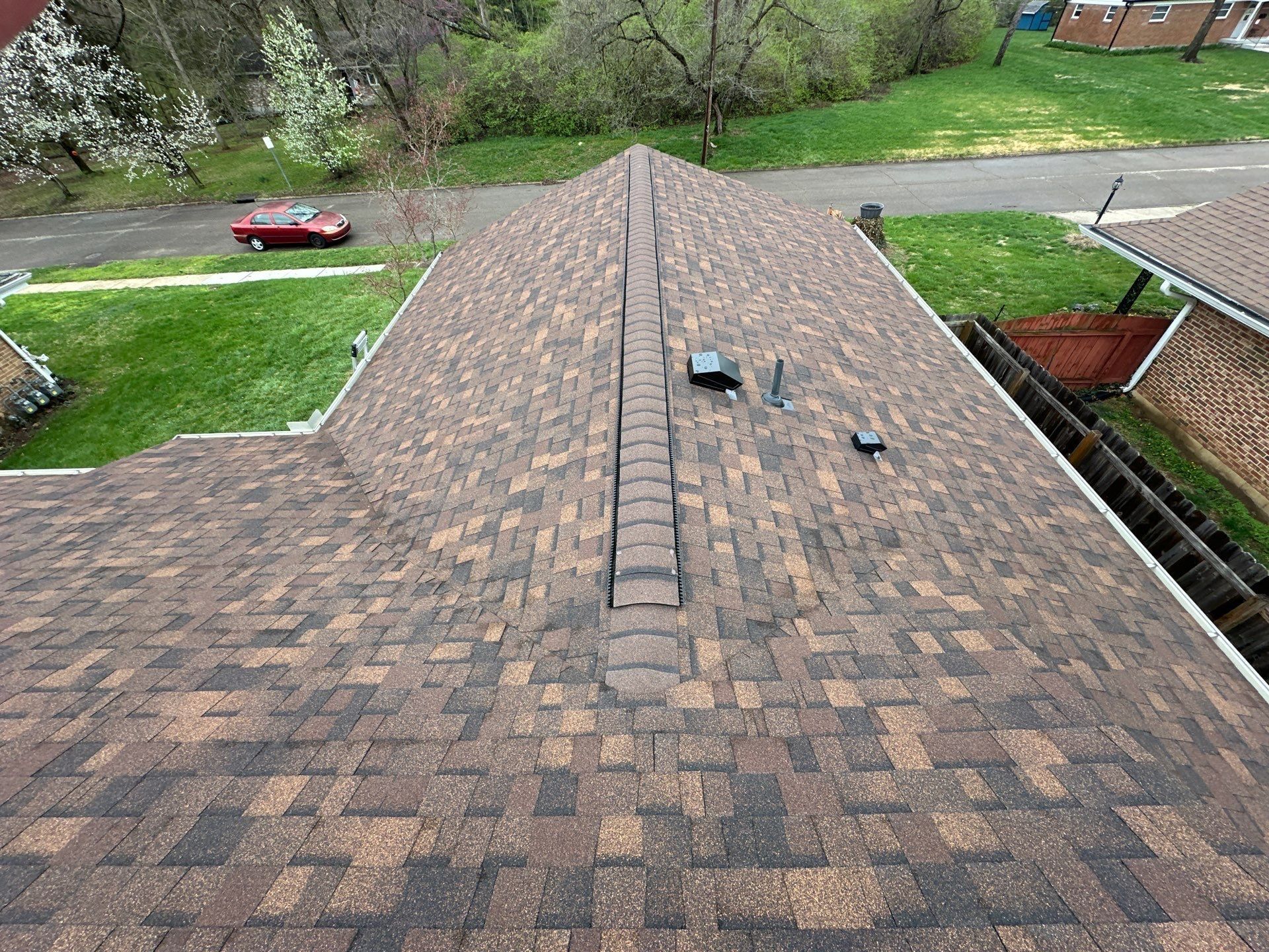 Ridge with the cap shingles over