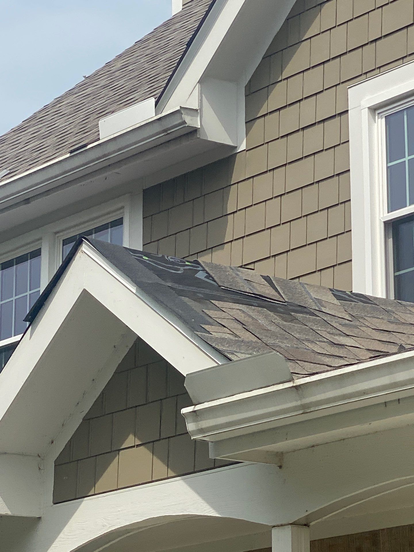 Finished shingles on the small porch gable beside the second story, Yellow Springs, Ohio.