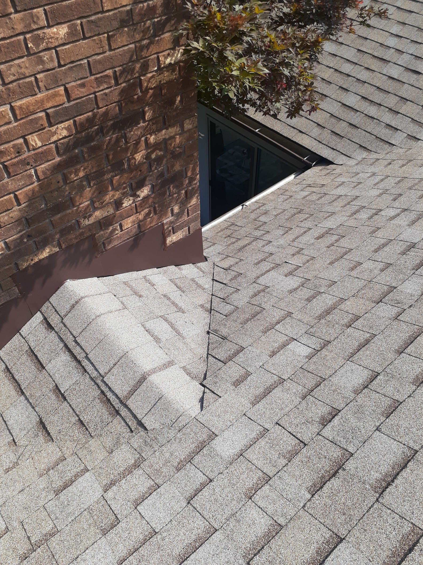 Chimney side flashing and valley finished on the new roof, Jamestown, Ohio.