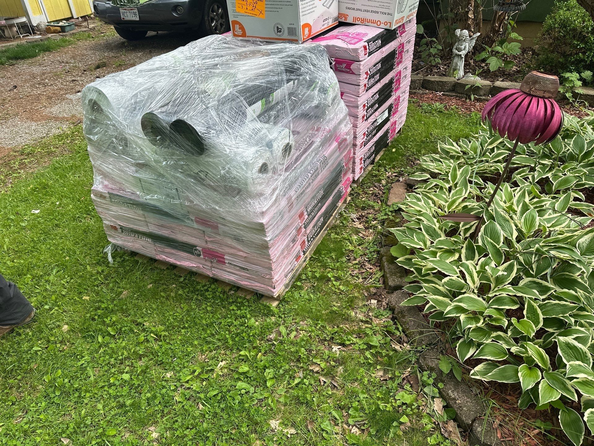 Duration bundles wrapped on a lawn pallet