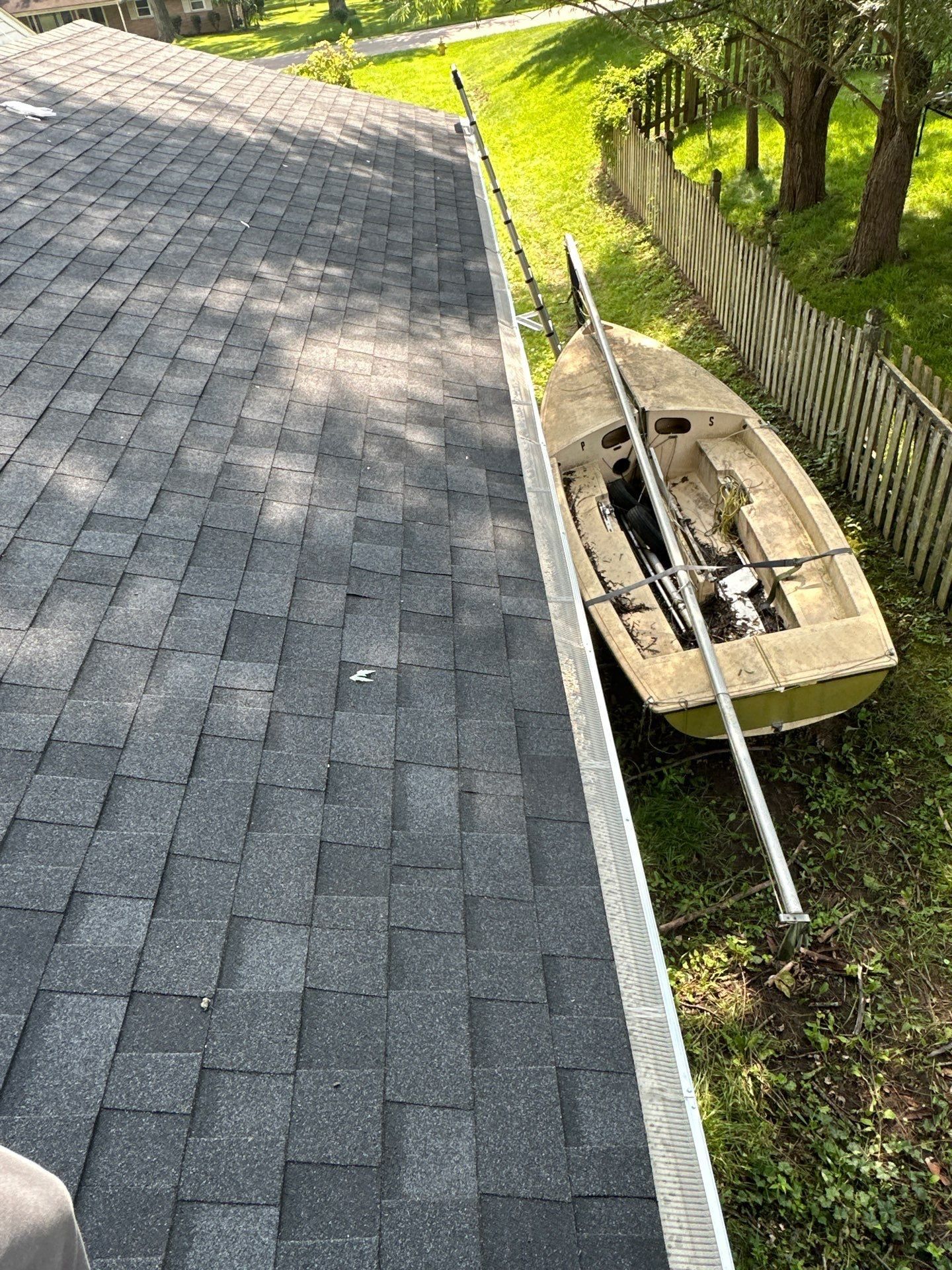 Plane, gutter, extension ladder and sailboat