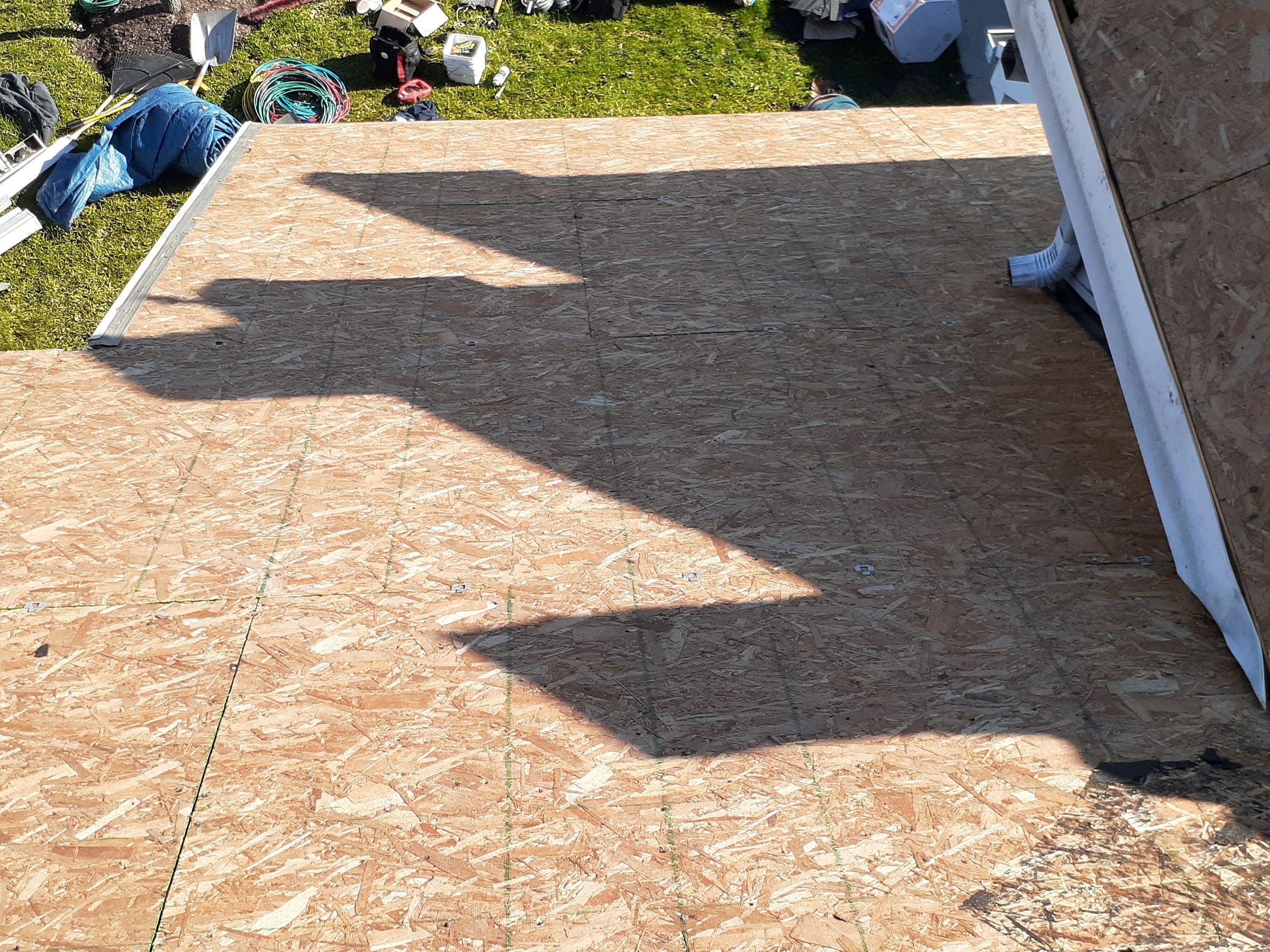The clean deck on the low roof against the upper wall, Xenia, Ohio.