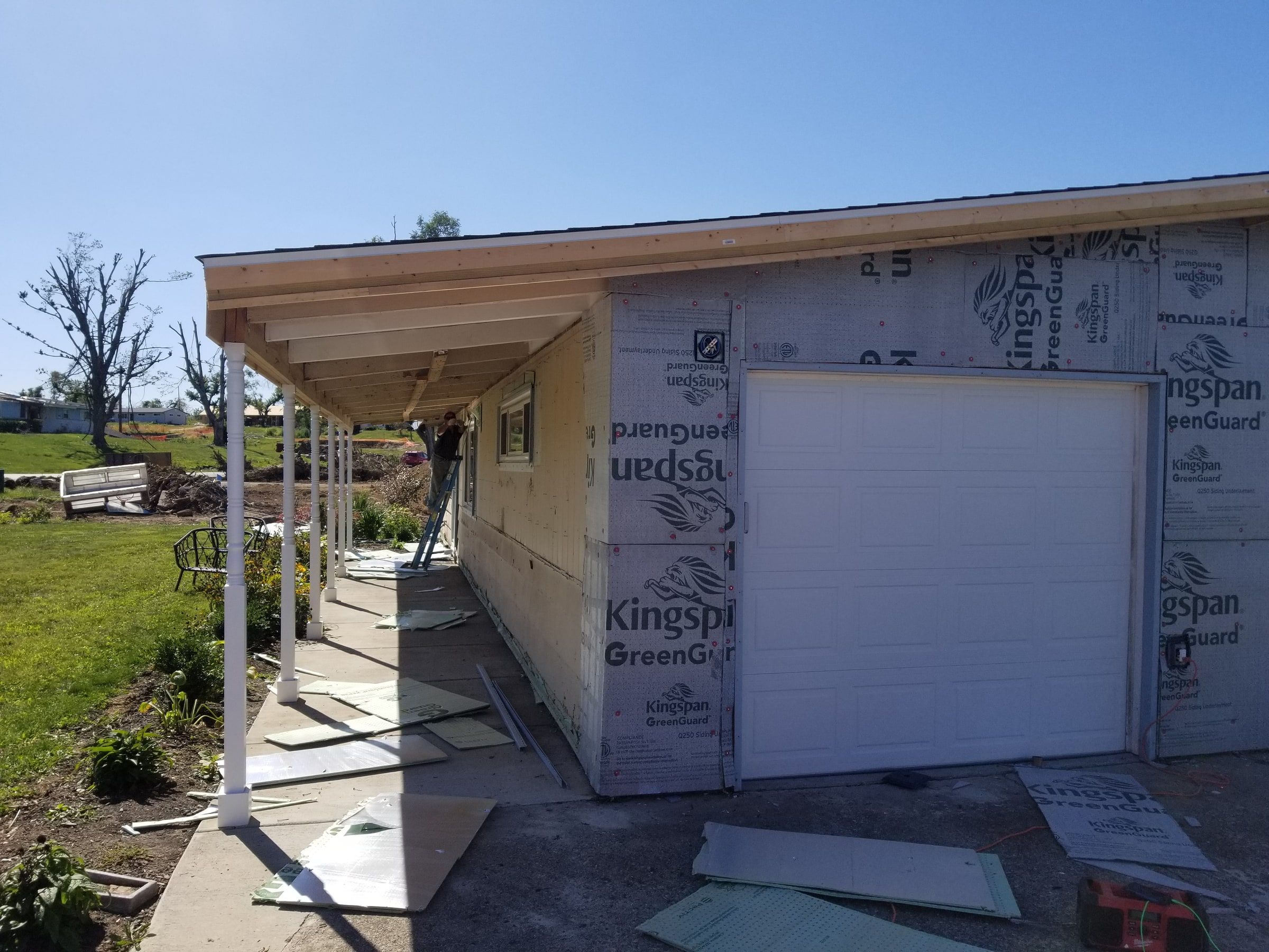 Fanfold board along the porch wall under the new framing, Beavercreek, Ohio.