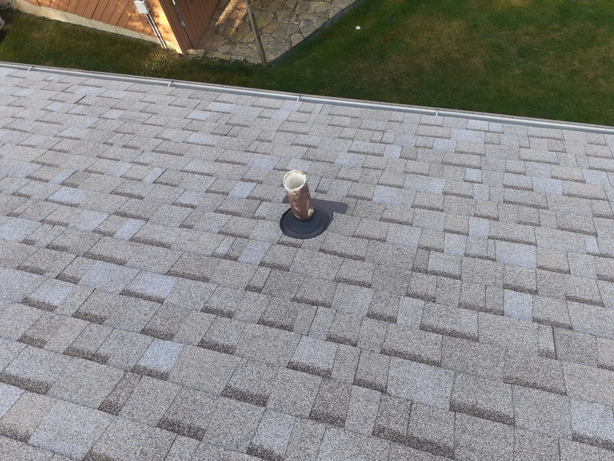 Pipe vent with its new boot sealed into the shingles, Jamestown, Ohio.