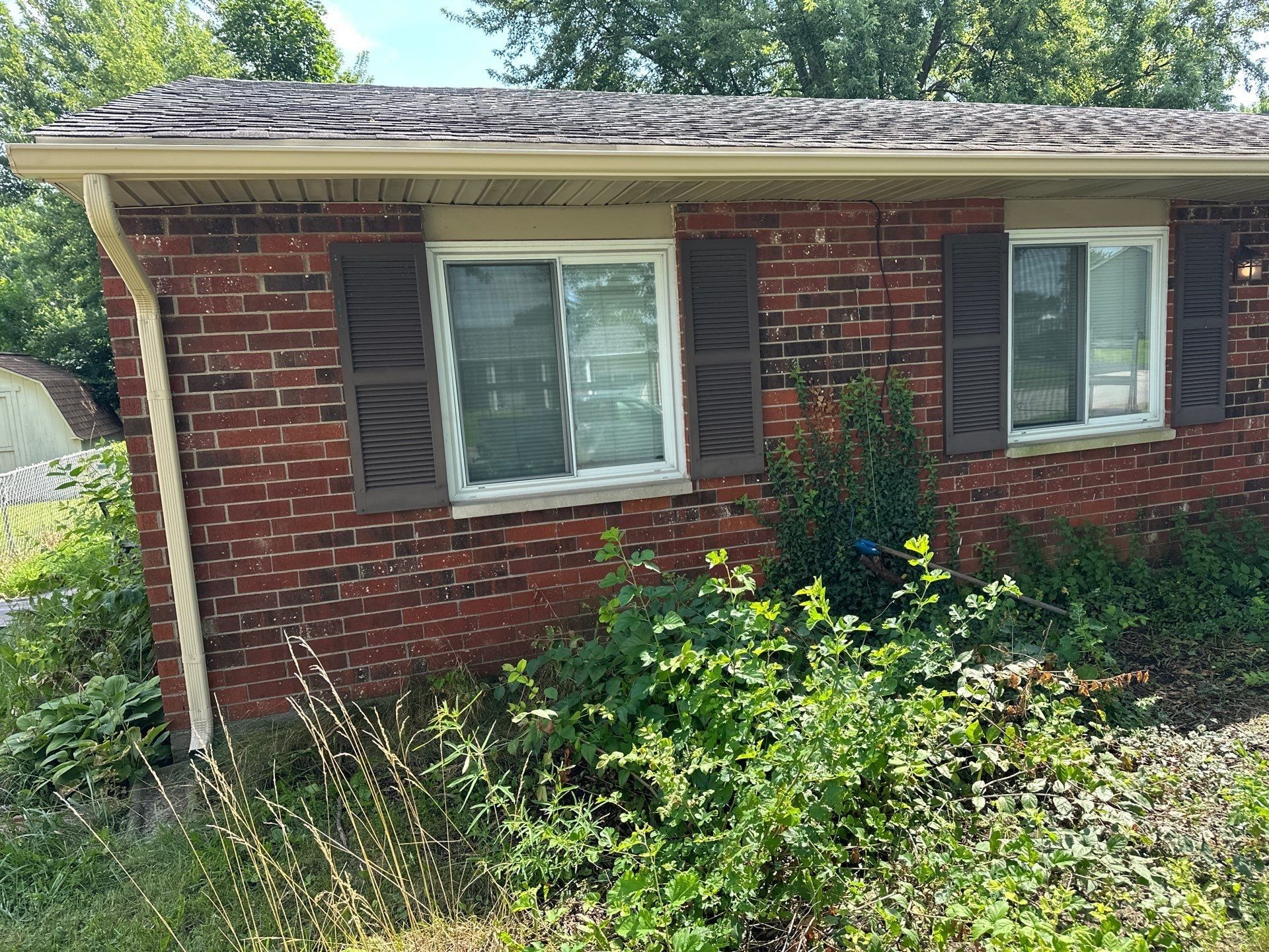 Sandtone gutter above the windows