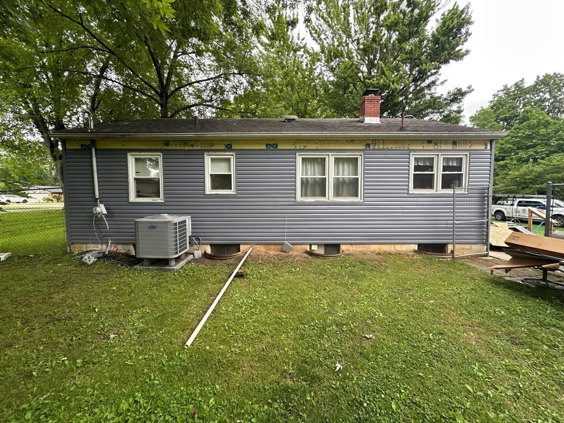 New siding along the long back wall with the trim still to finish, Beavercreek, Ohio.