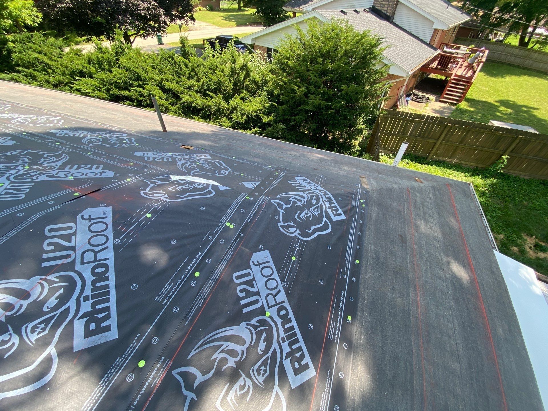Hip slope fully covered in RhinoRoof U20 synthetic underlayment, Beavercreek, Ohio.