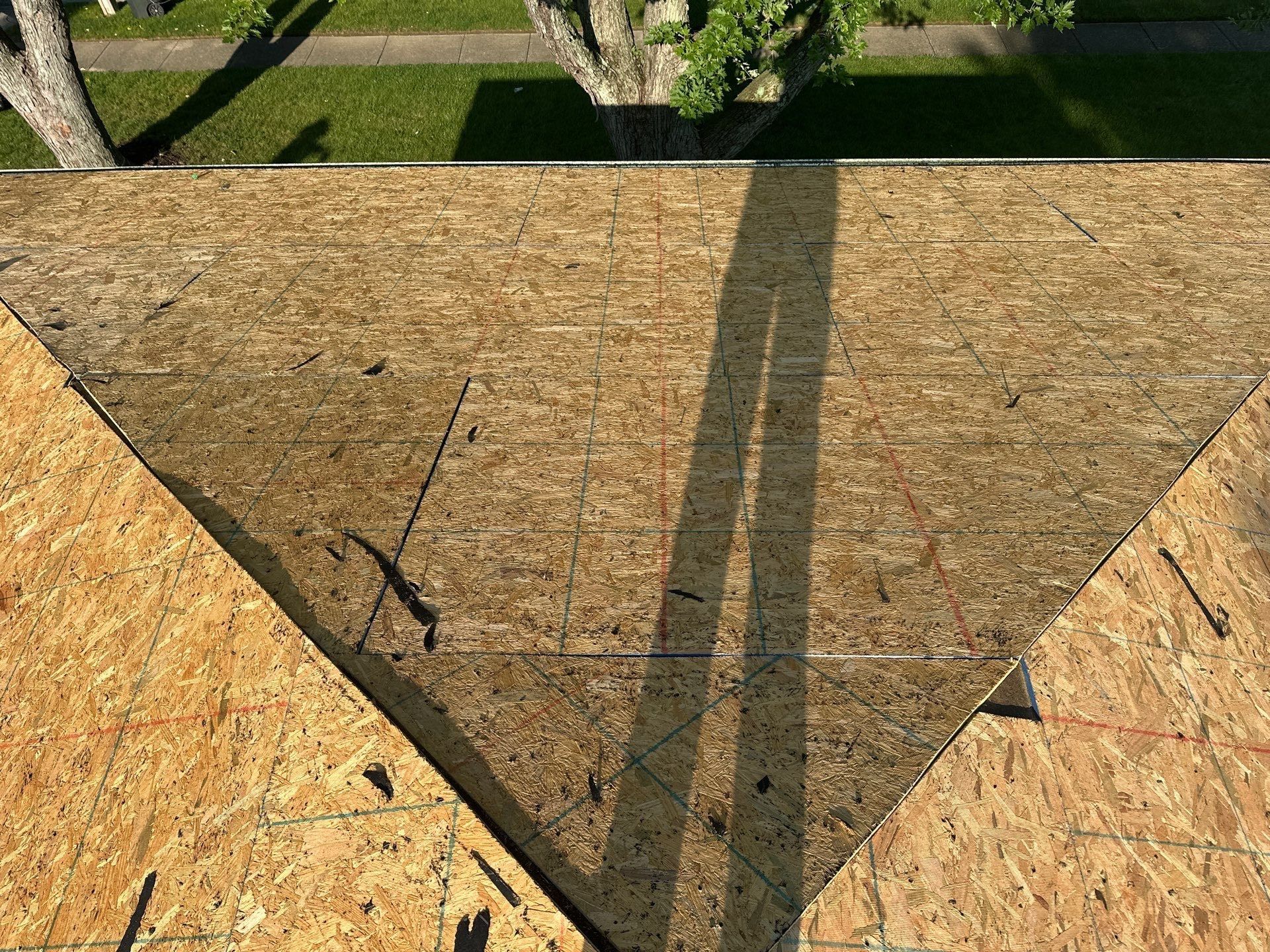 The clean deck over the front slope, with the street below, Dayton, Ohio.