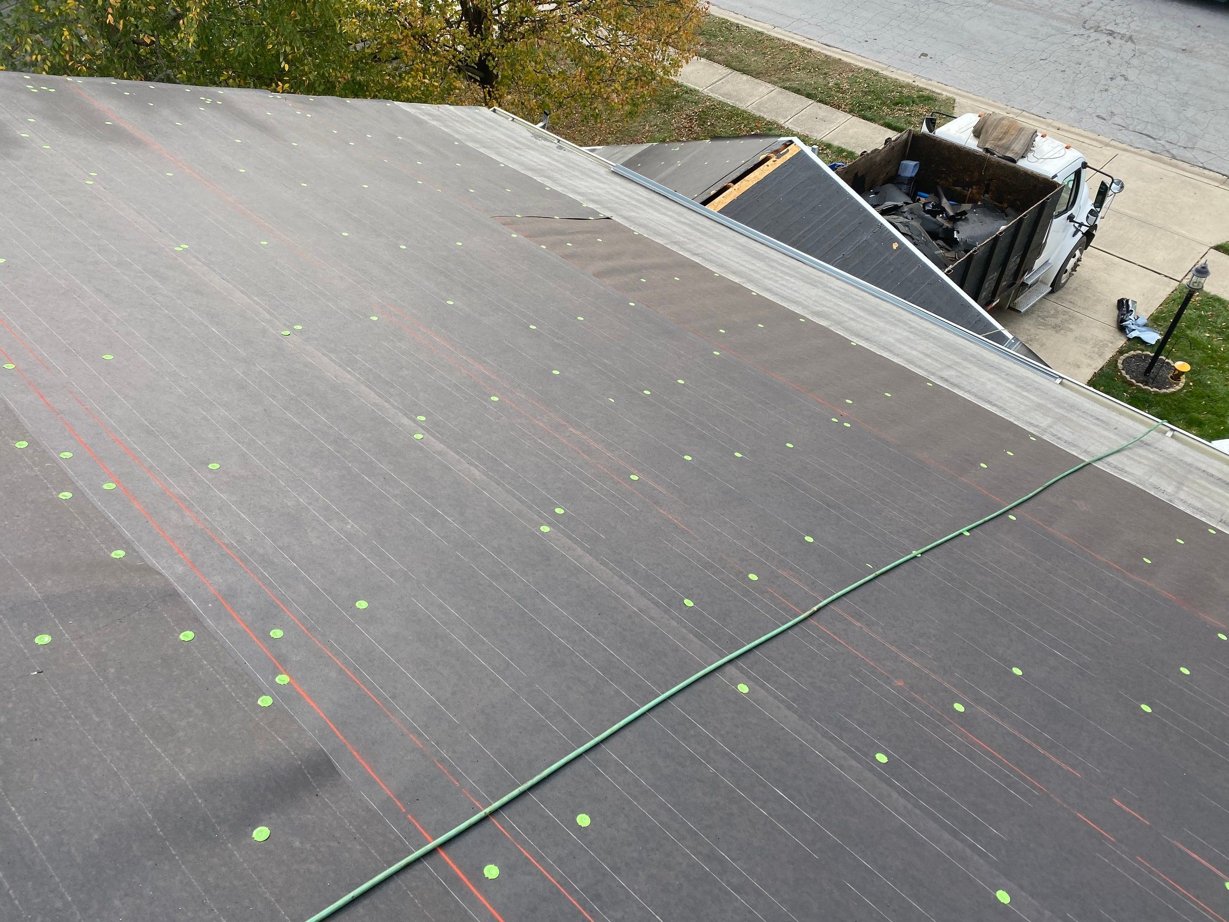 Underlayment, cap nails and chalk lines