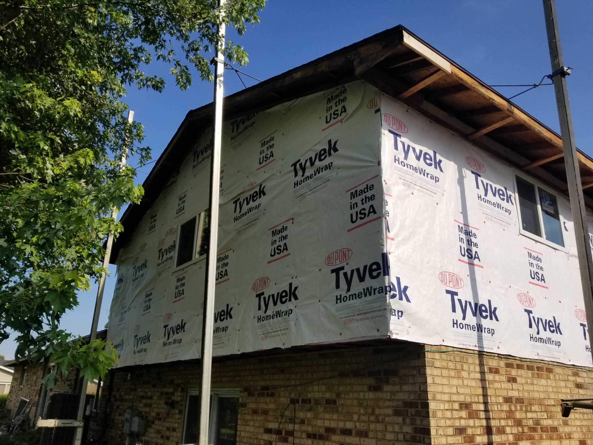 House wrap around the corner of the upper story, Beavercreek, Ohio.