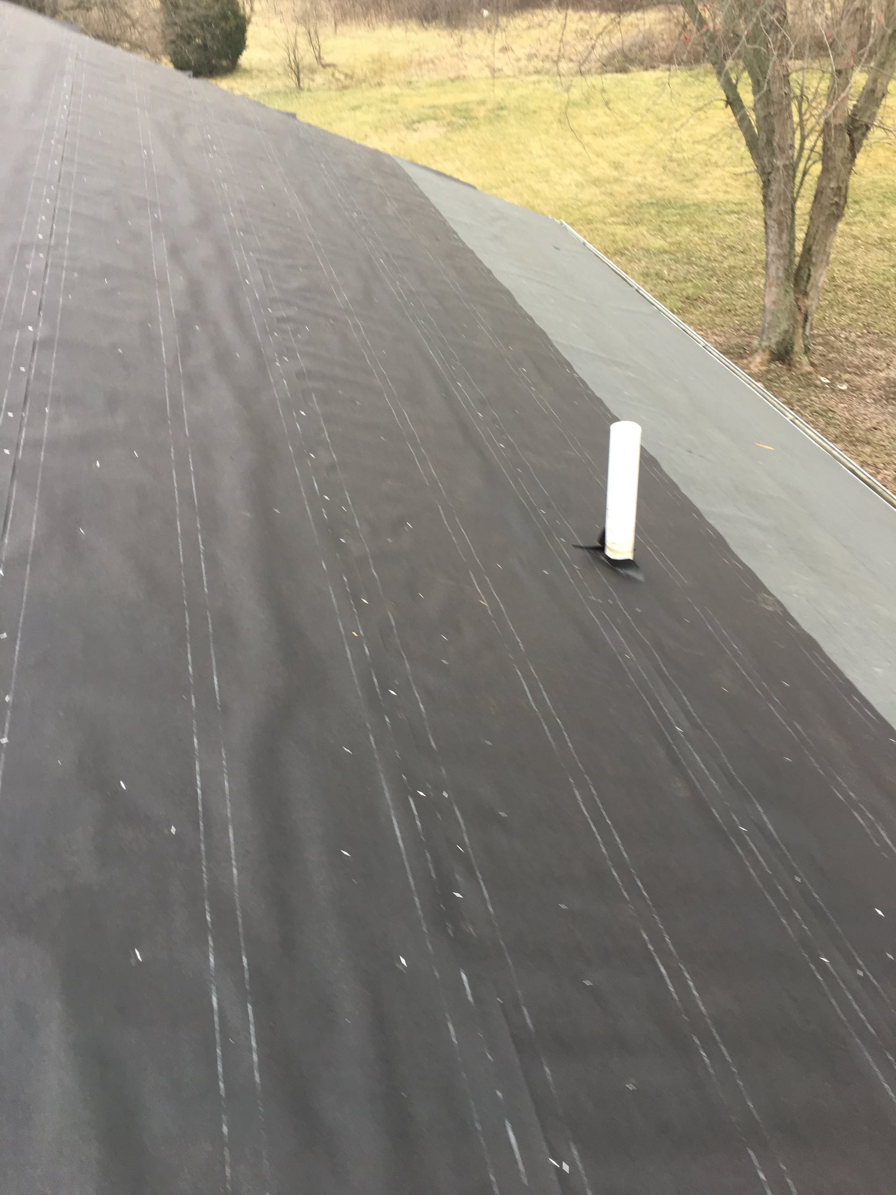 Underlayment and a collared vent pipe