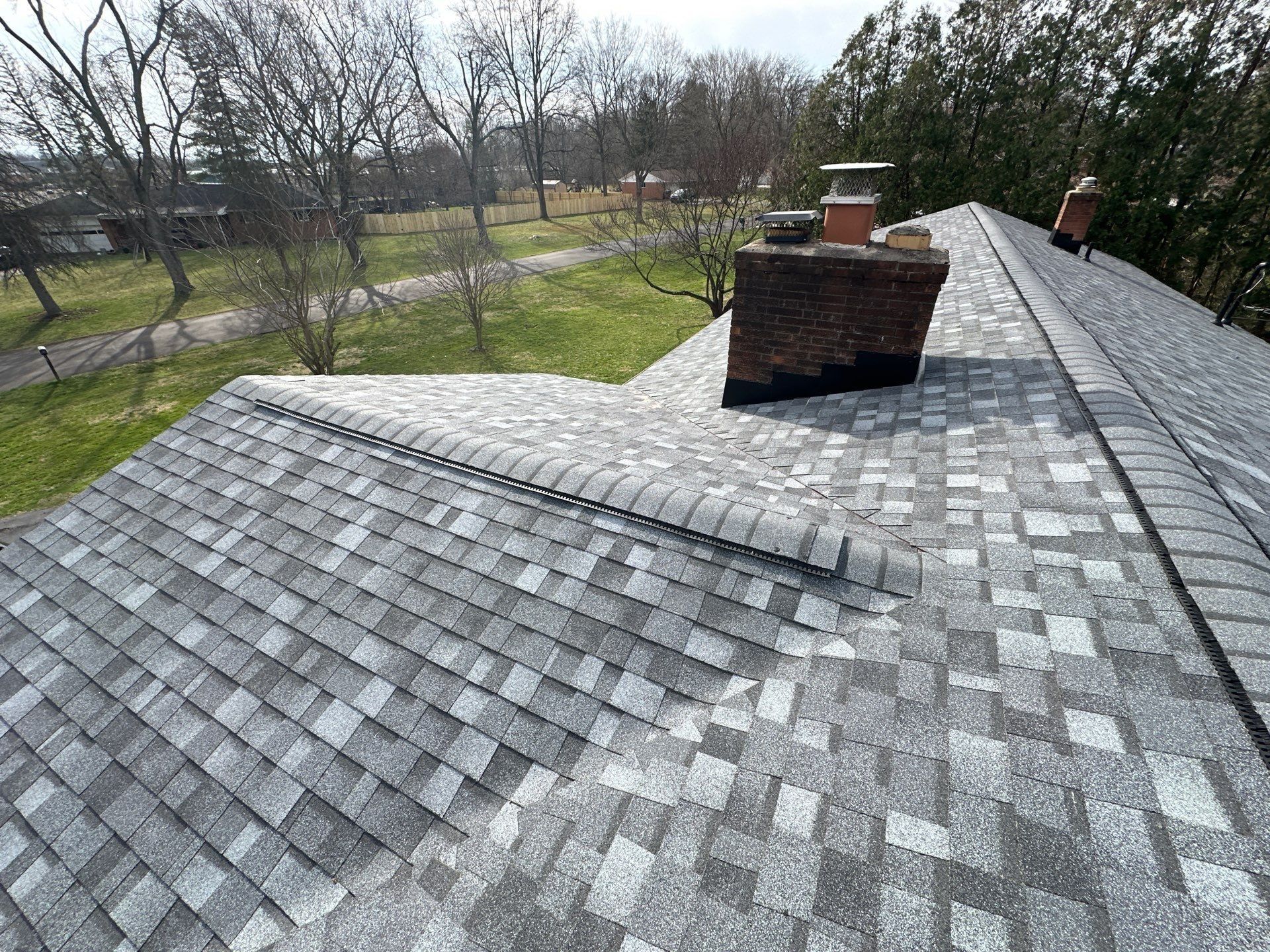 The finished roof around the chimney and a short ridge, Beavercreek, Ohio.