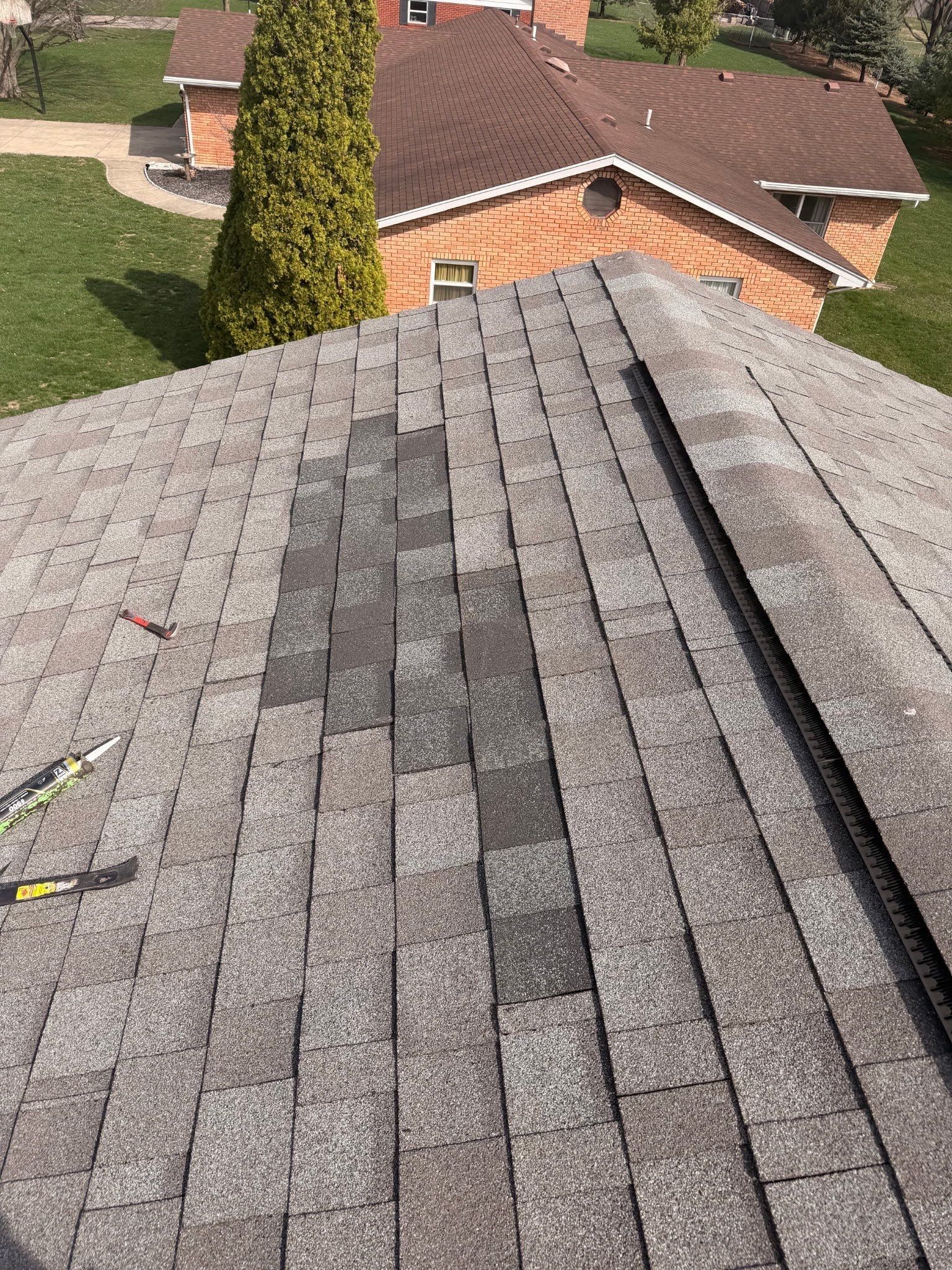 Repaired plane and surrounding roof