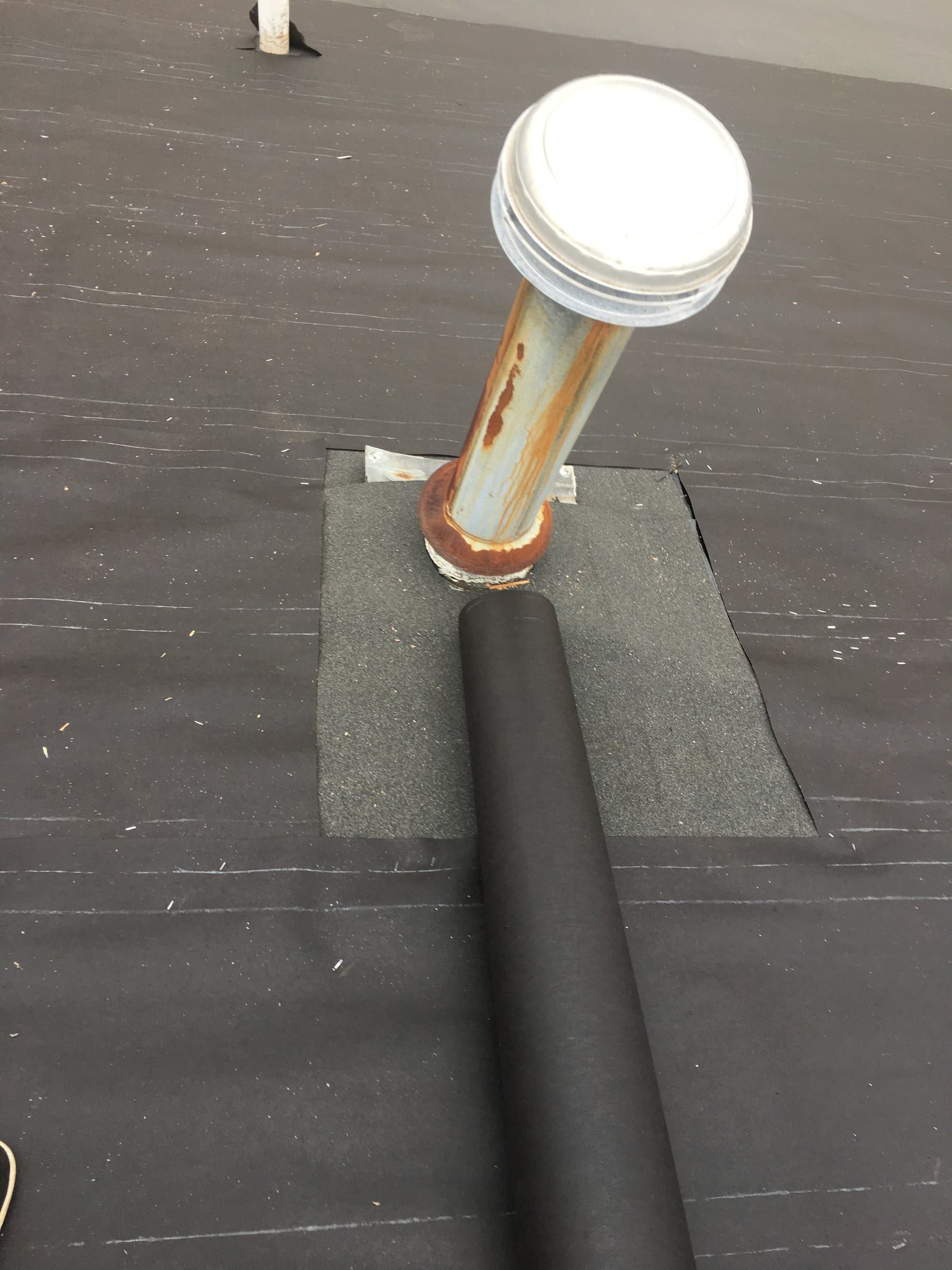 Ice and water shield at a flue penetration