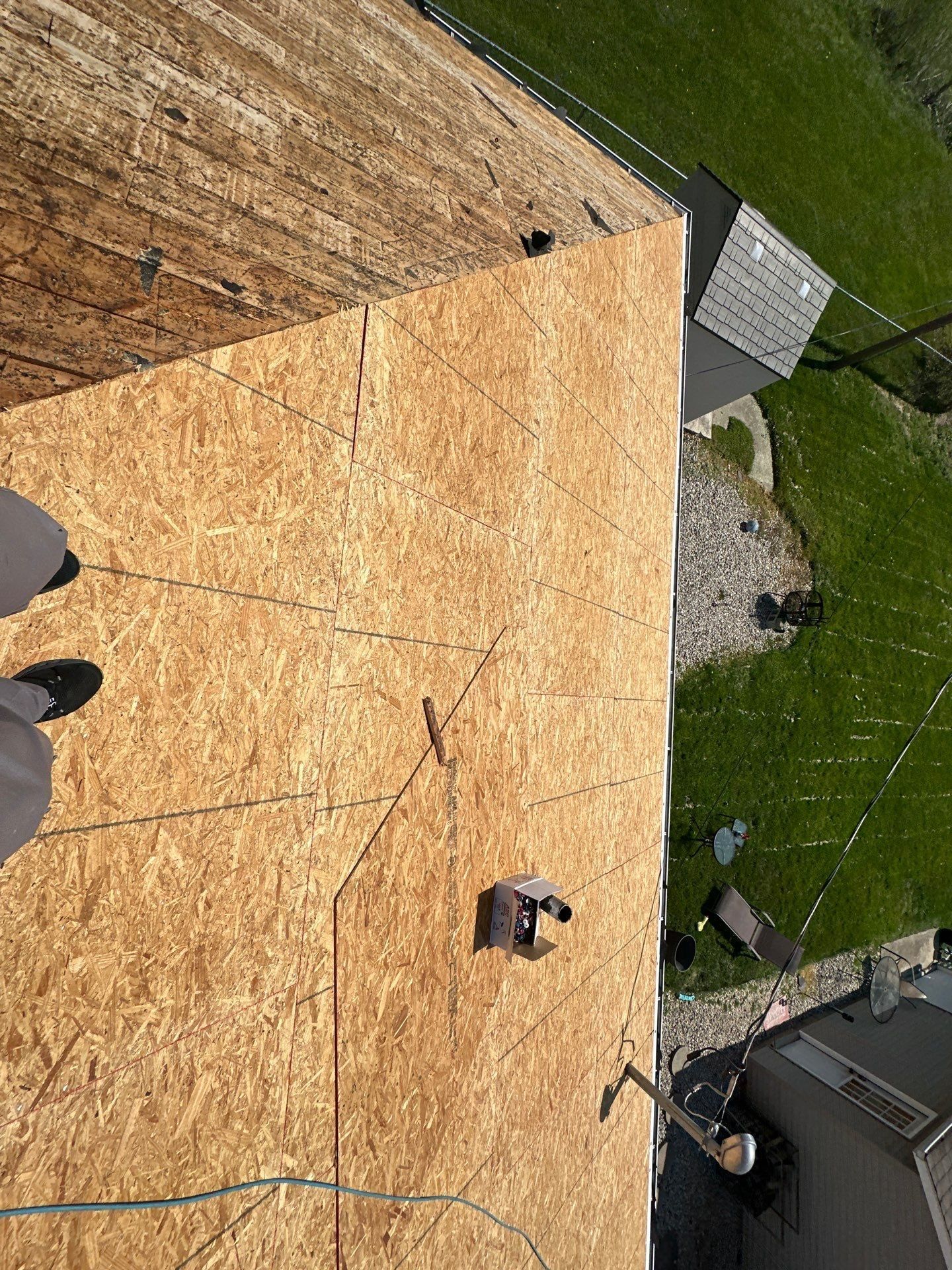 New OSB sheathing down the slope toward the yard, Beavercreek, Ohio.