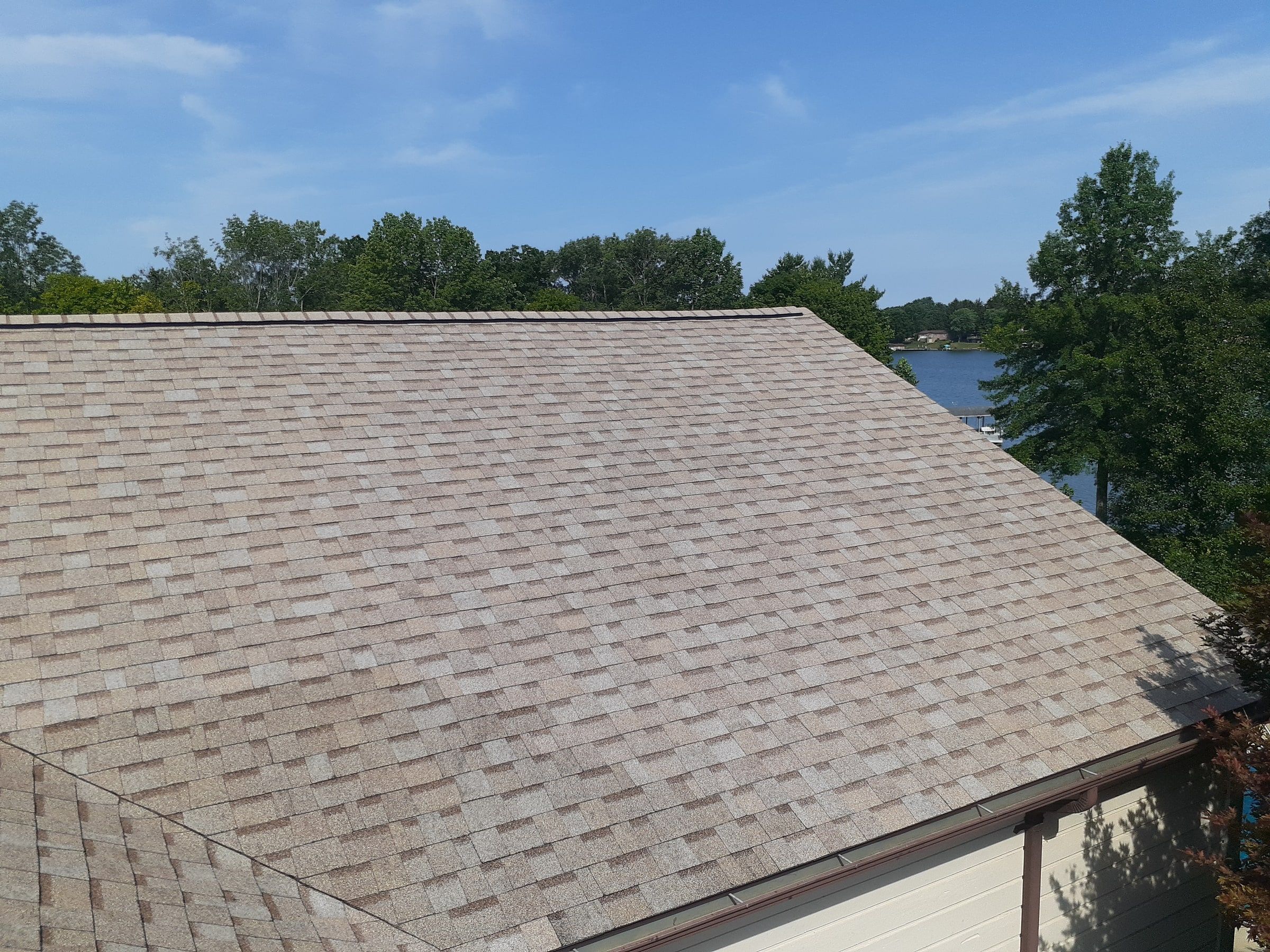 Finished back slope over the lake with straight shingle rows, Jamestown, Ohio.