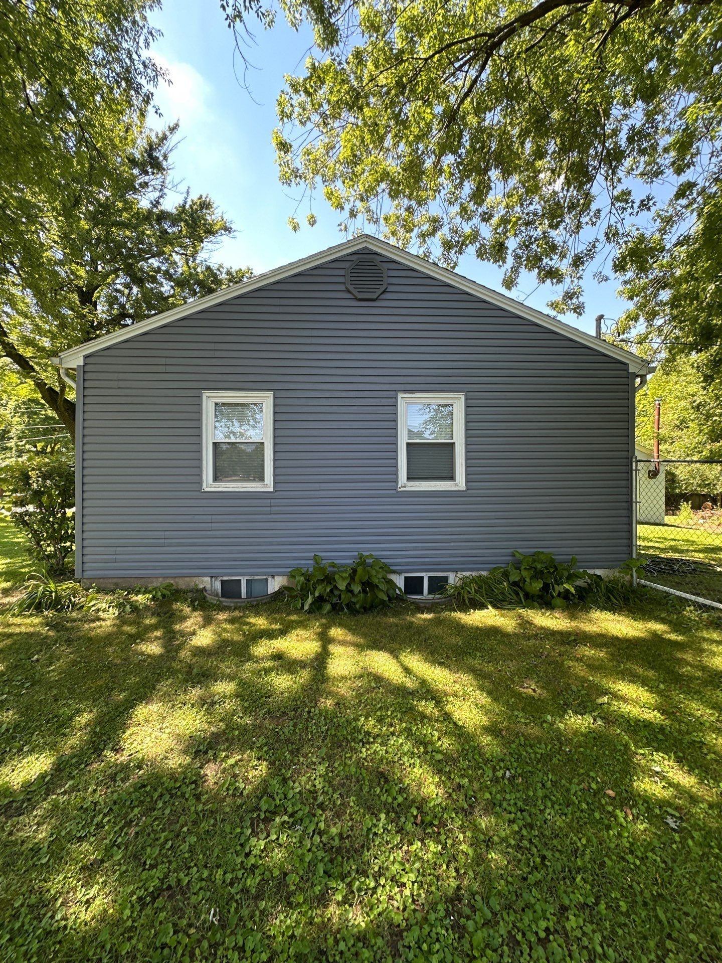 Gable end and new siding