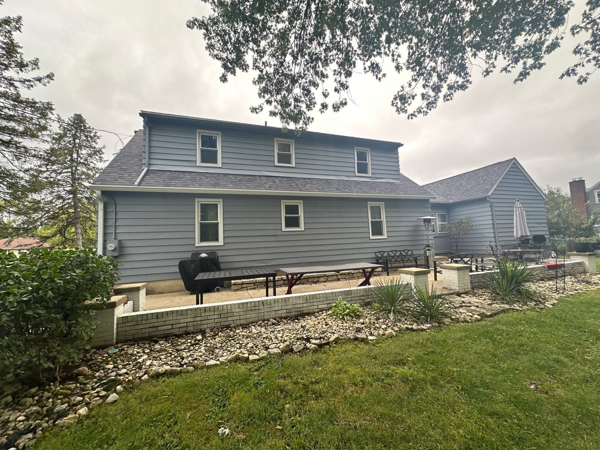 The back of the house with its finished roof and dormer, Beavercreek, Ohio.