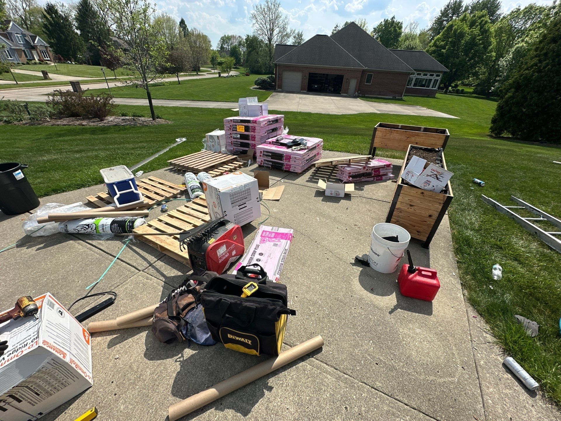 Working driveway with material and tools