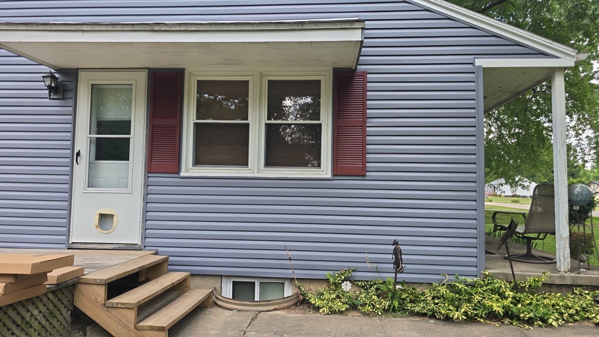 New red shutters beside the back window, Beavercreek, Ohio.