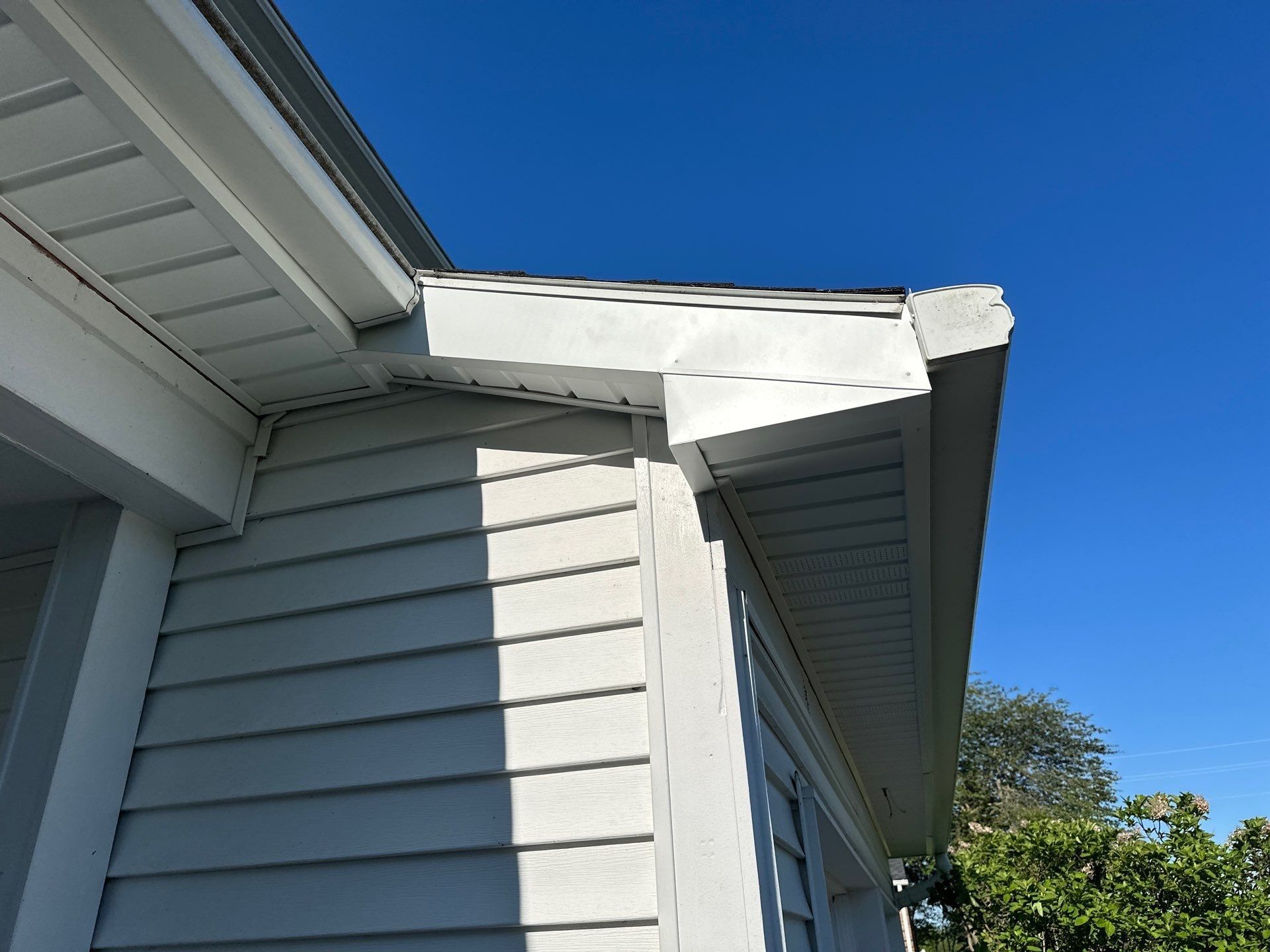 New soffit and wrapped trim at a front corner of the house, Bellbrook, Ohio.