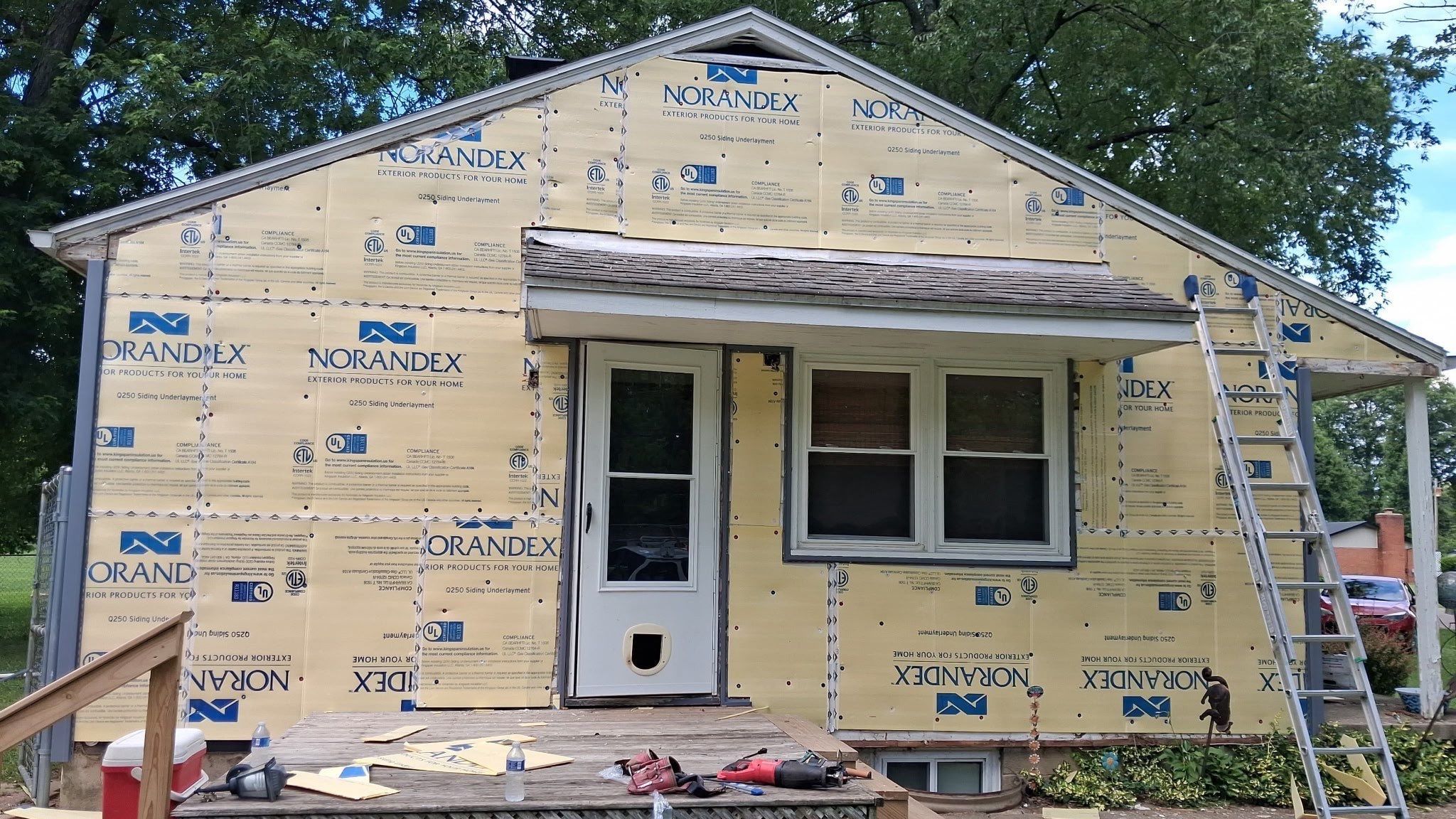 The back wall in insulation board around the door and window, Beavercreek, Ohio.