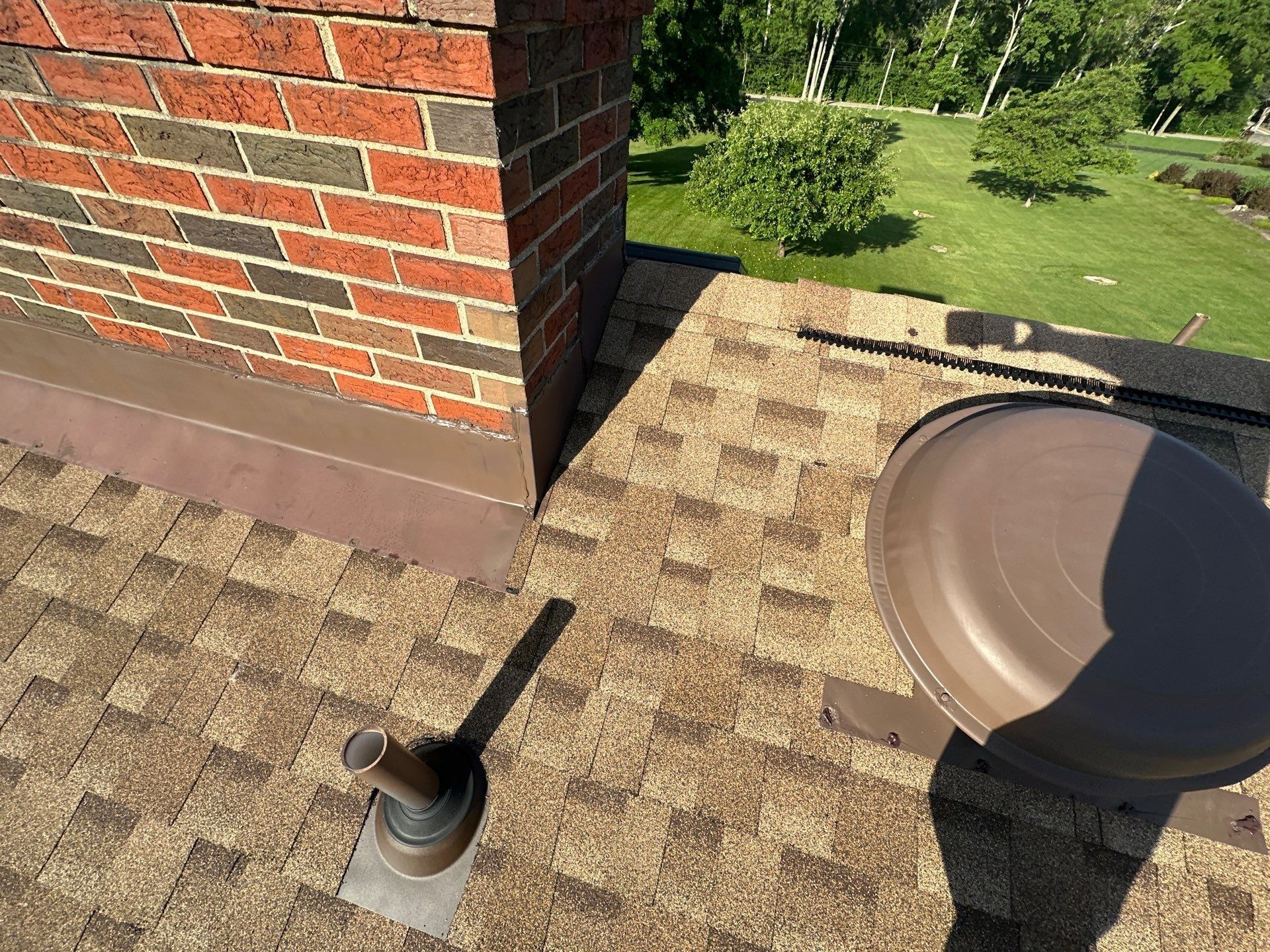Flashing set into the brick chimney