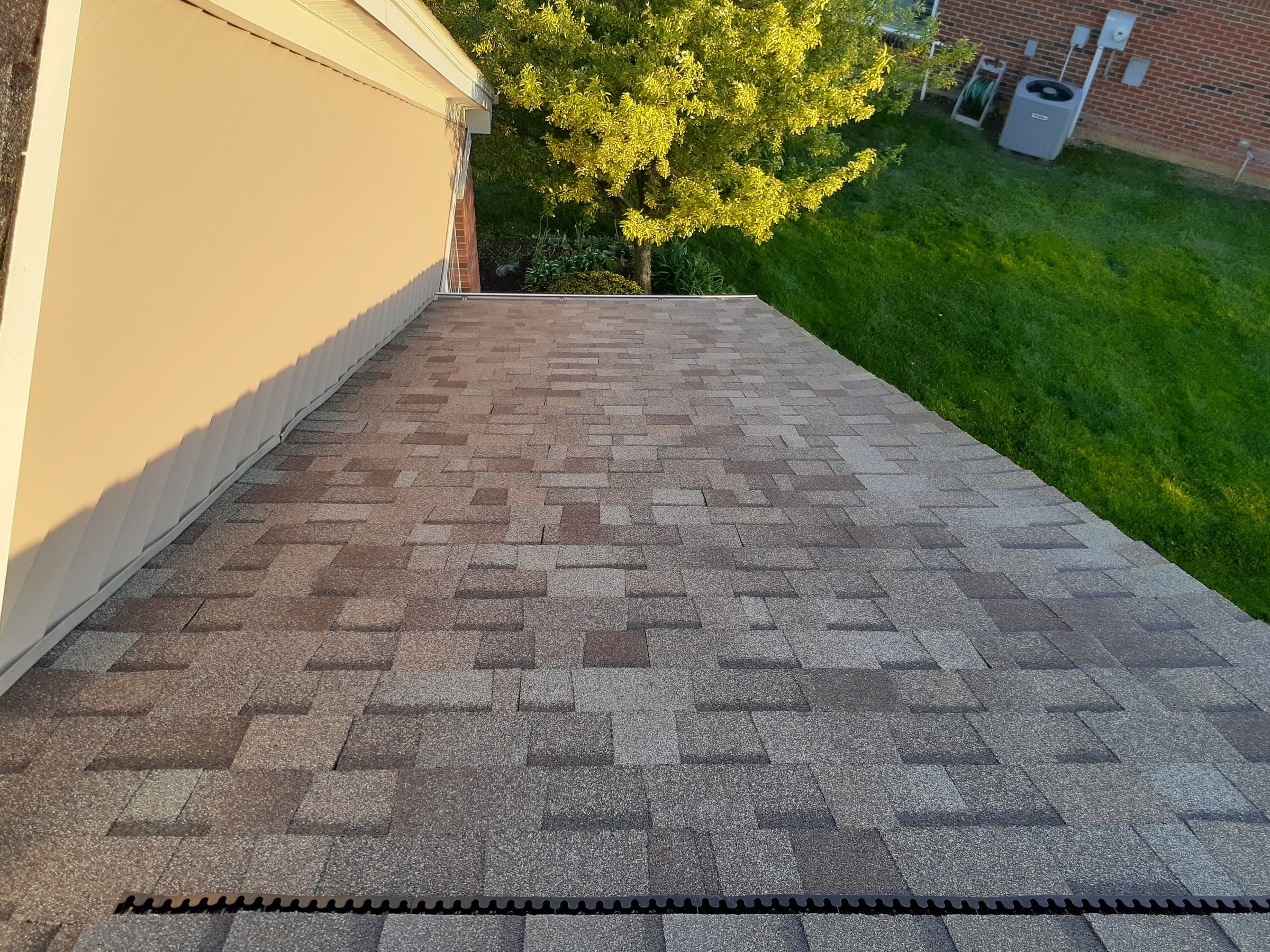 Roof over the garage and hip vent