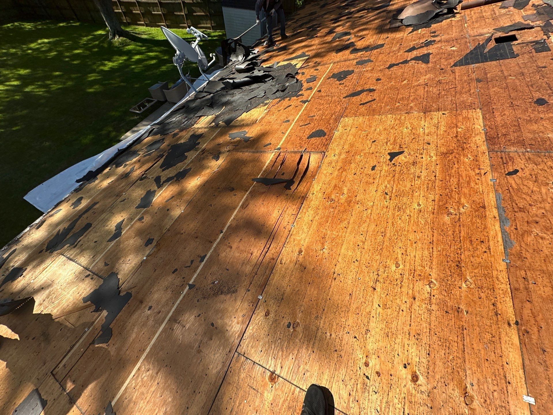 The old plywood deck after tear-off on the back slope, Beavercreek, Ohio.