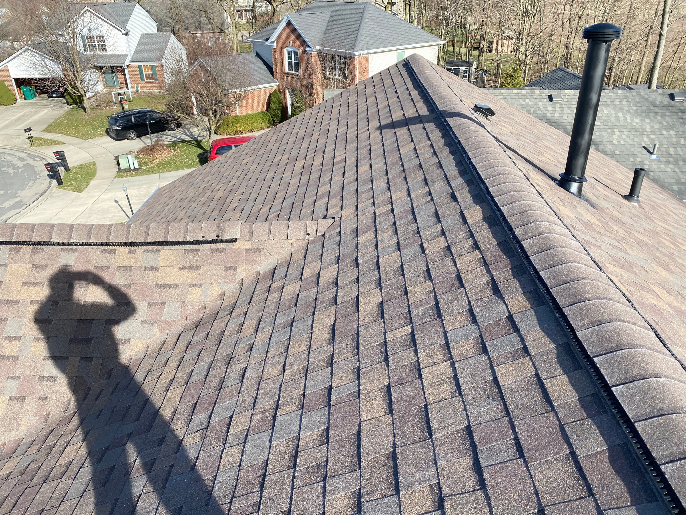 The finished roof and a vent stack seen from the ridge, Fairborn, Ohio.