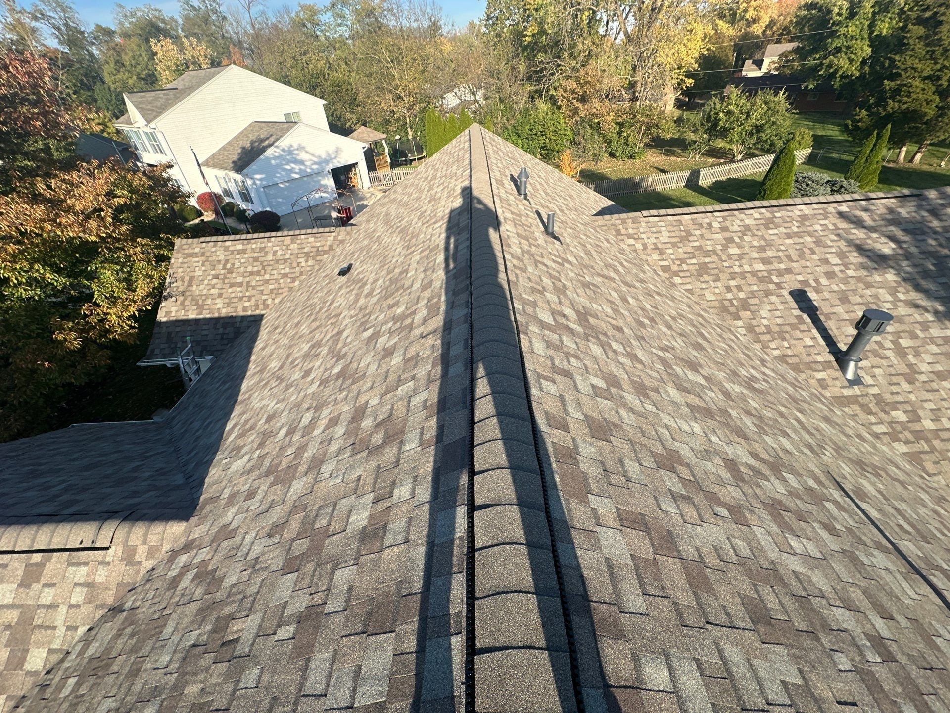 The finished main ridge with exhaust vents on both slopes, Beavercreek, Ohio.