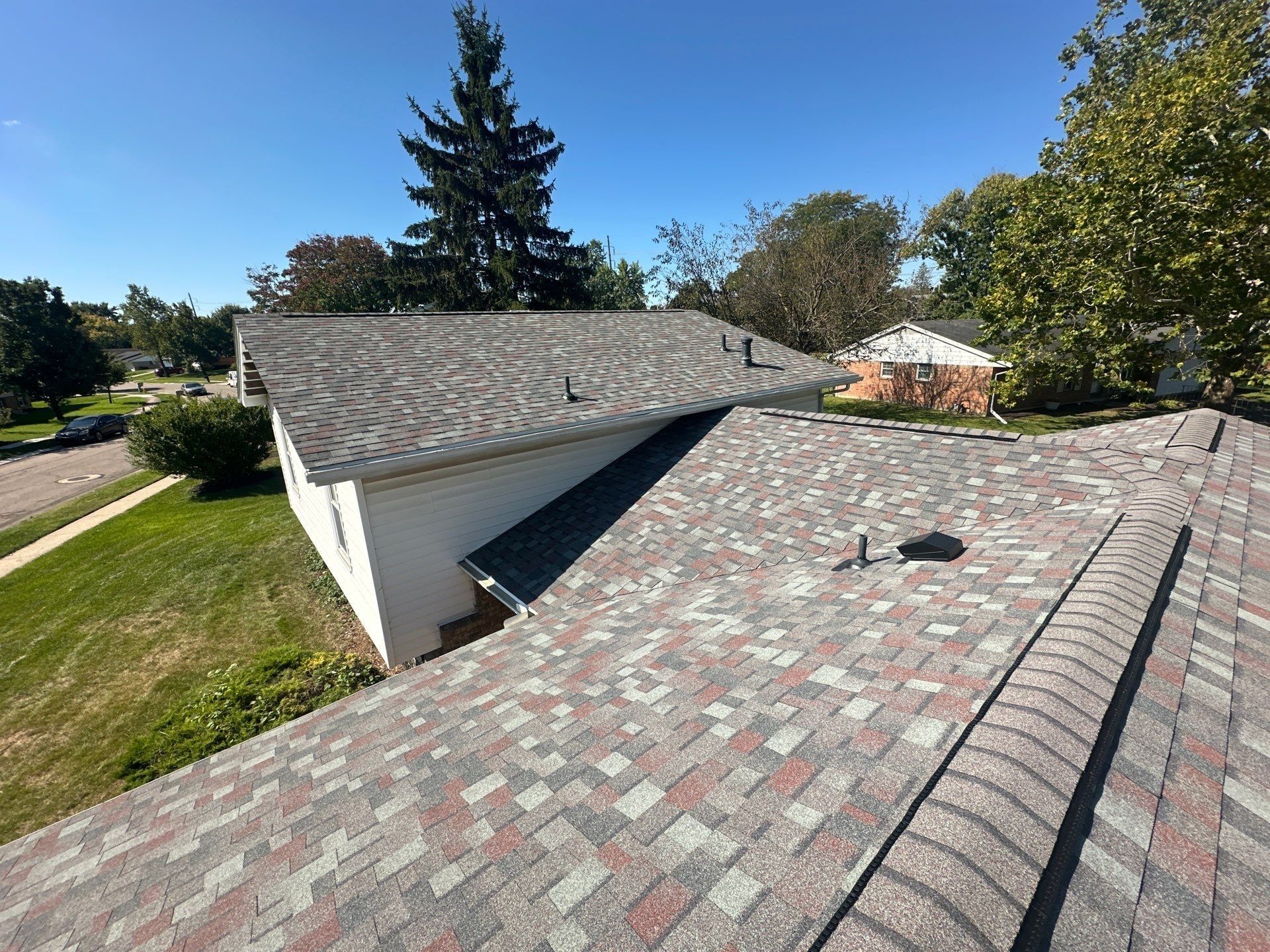 The finished roof from the upper ridge, with the white siding beside it, West Carrollton, Ohio.
