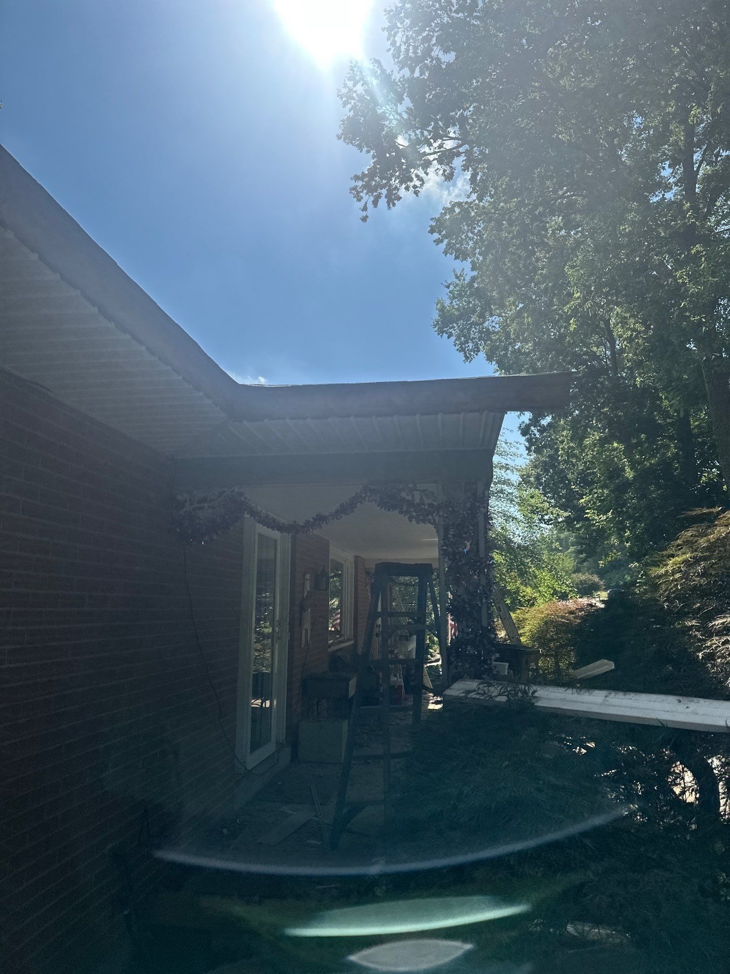 New white soffit under the porch eave
